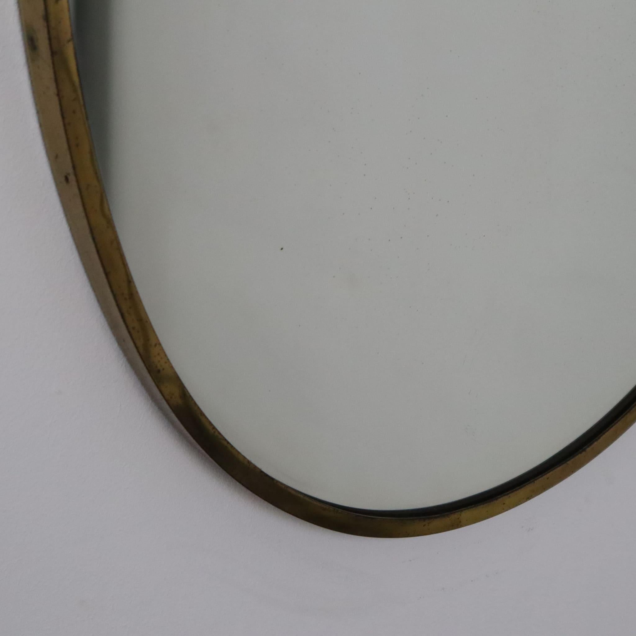 Miroir mural ovale italien en laiton massif, style Gio Ponti, années 1950, Mid-Century Modern Bon état - En vente à Nicolosi, IT