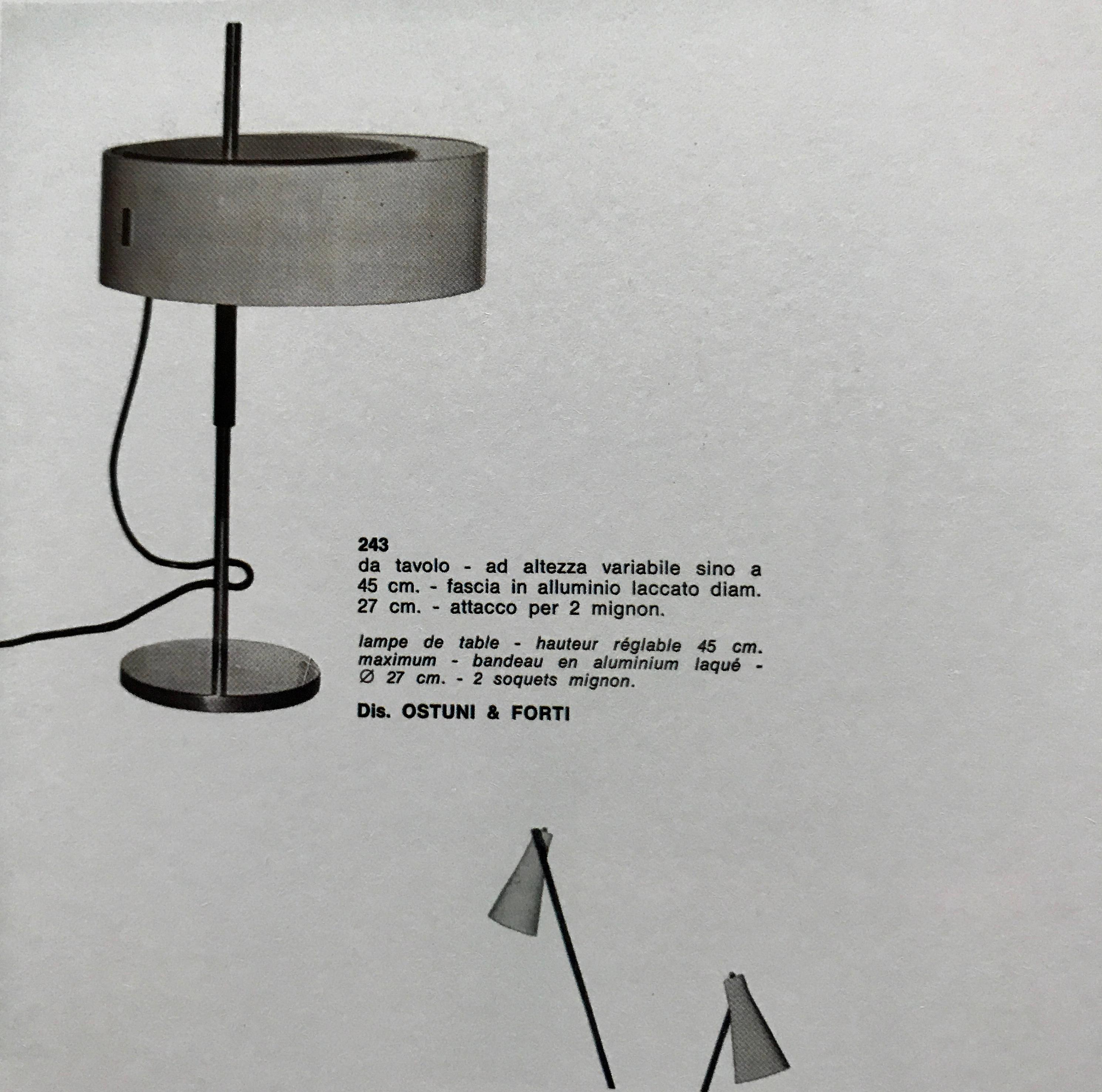 1950s Giuseppe Ostuni 243 table lamp for O-Luce. Executed in black painted metal and brass. An iconic table lamp by one of the masters of midcentury Italian design. Fluid and refined in its conception and execution. A clean example.

Literature