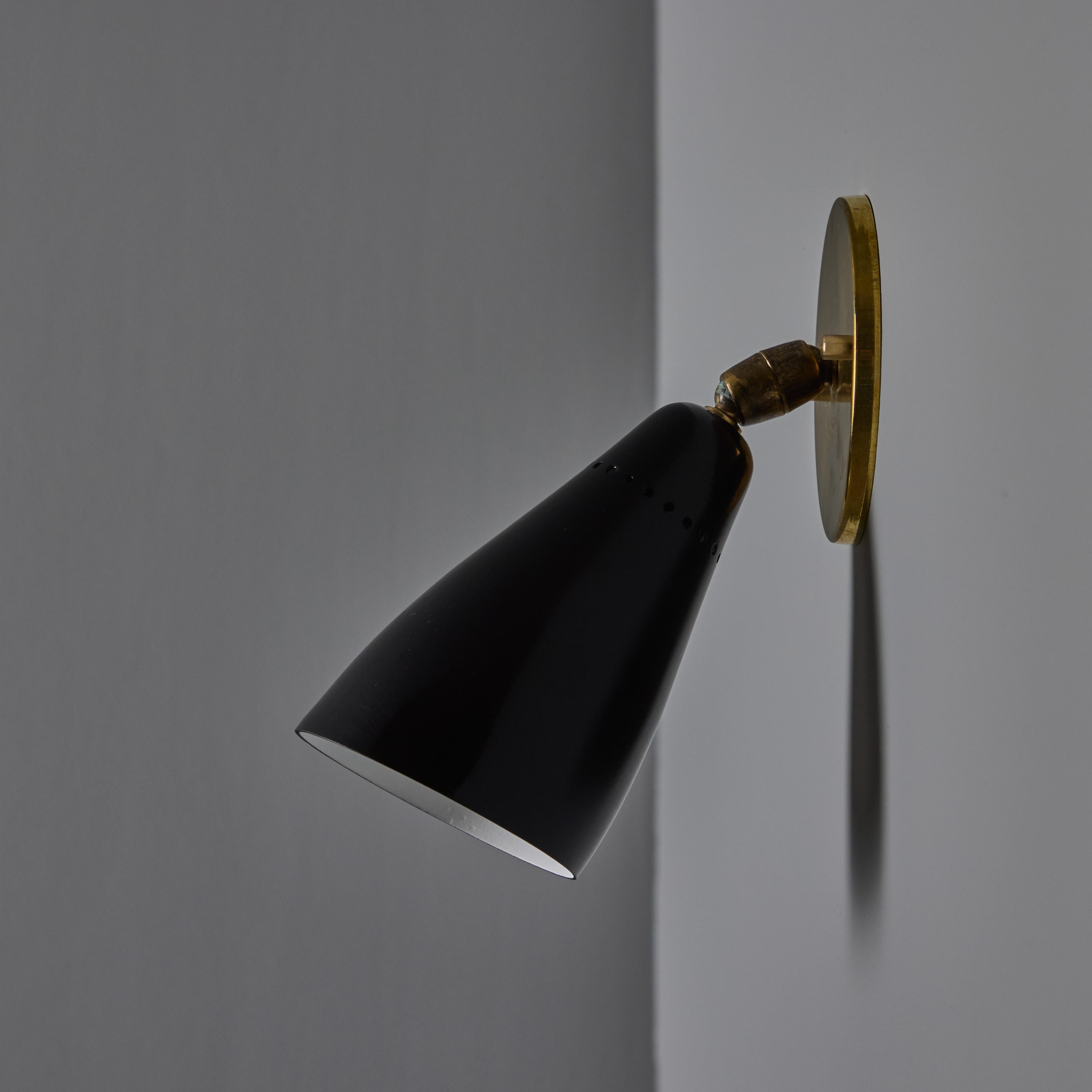 Painted 1950s Giuseppe Ostuni Model #101 Black Articulating Sconce for O-Luce For Sale