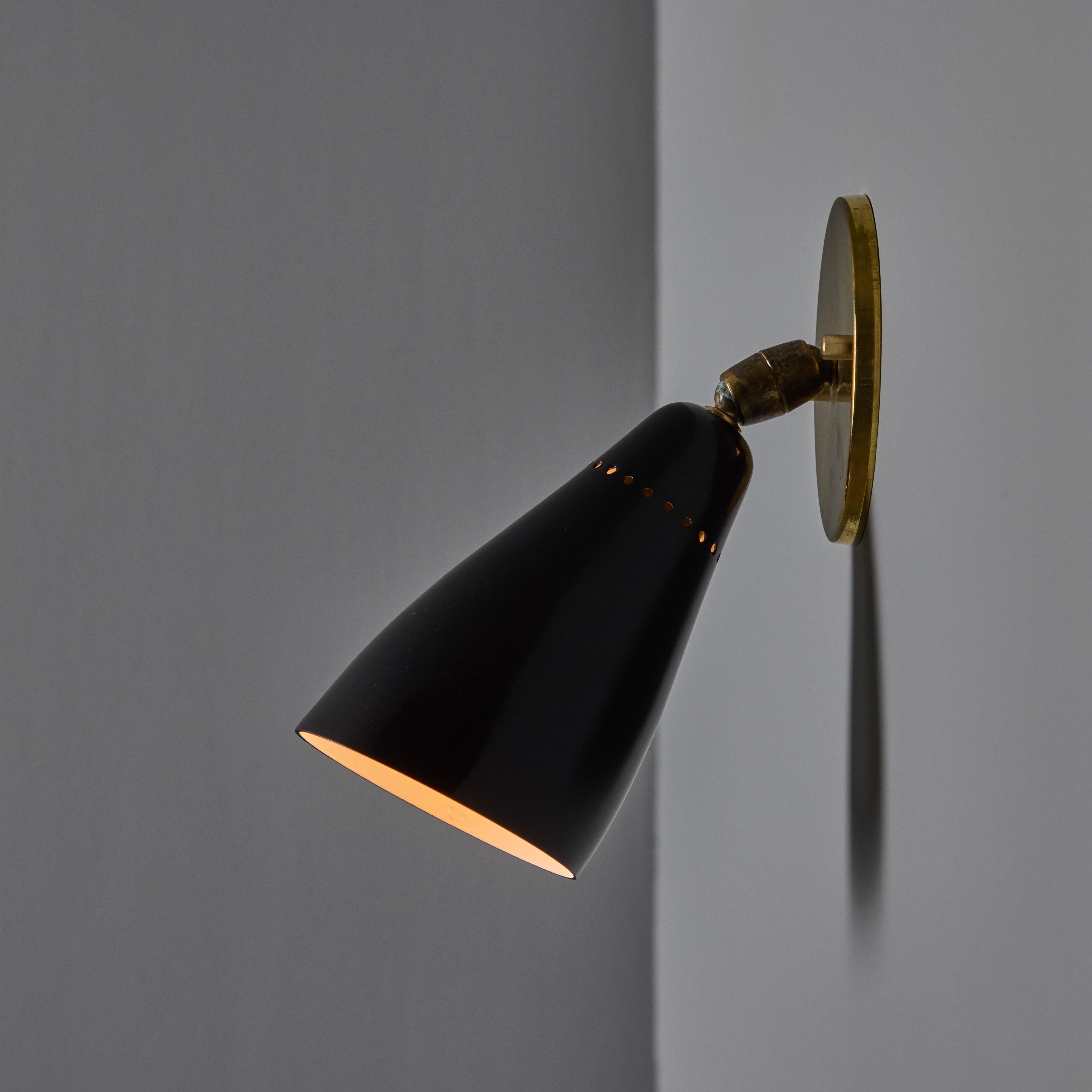 1950s Giuseppe Ostuni Model #101 Black Articulating Sconce for O-Luce In Good Condition For Sale In Glendale, CA