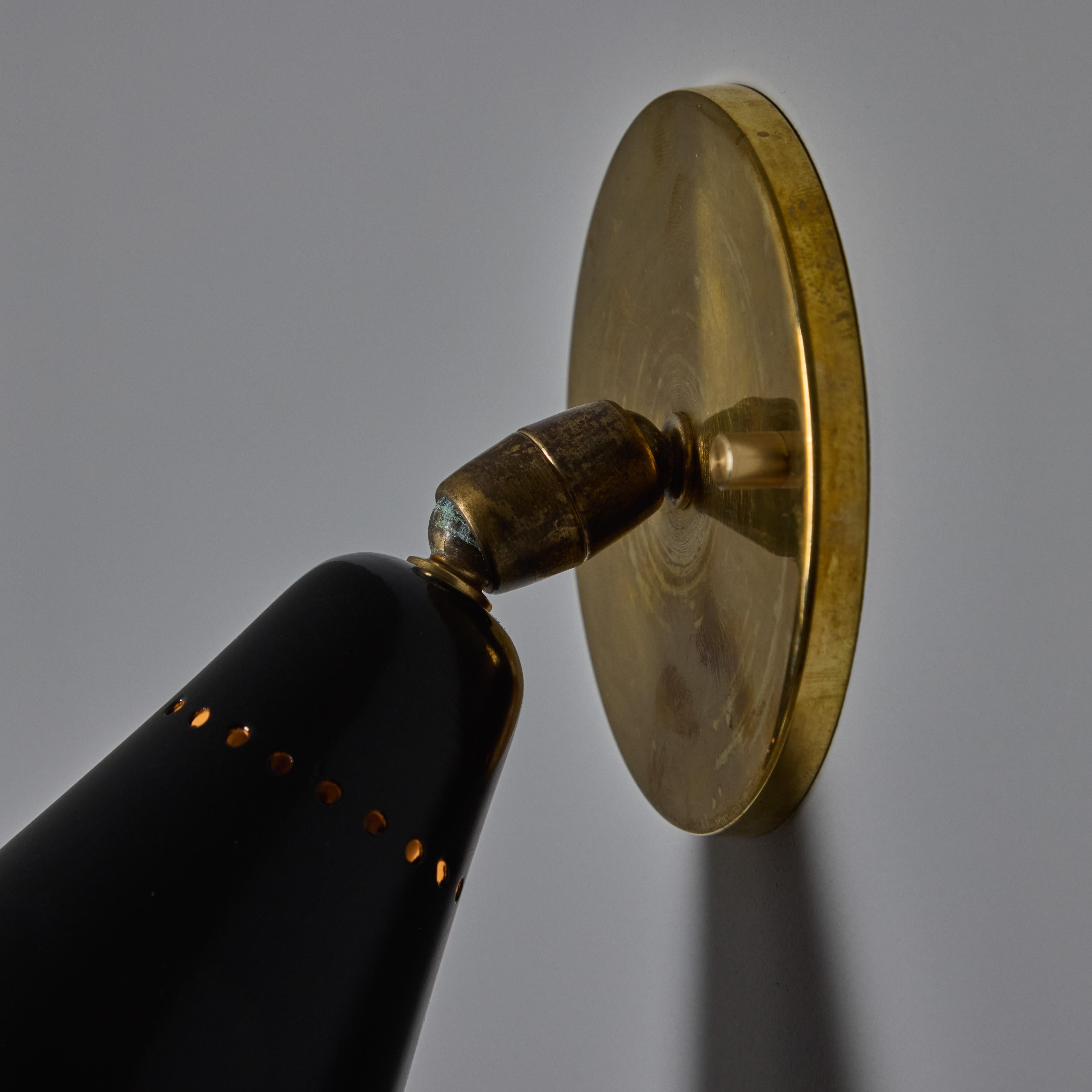 1950s Giuseppe Ostuni Model #101 Black Articulating Sconce for O-Luce For Sale 1