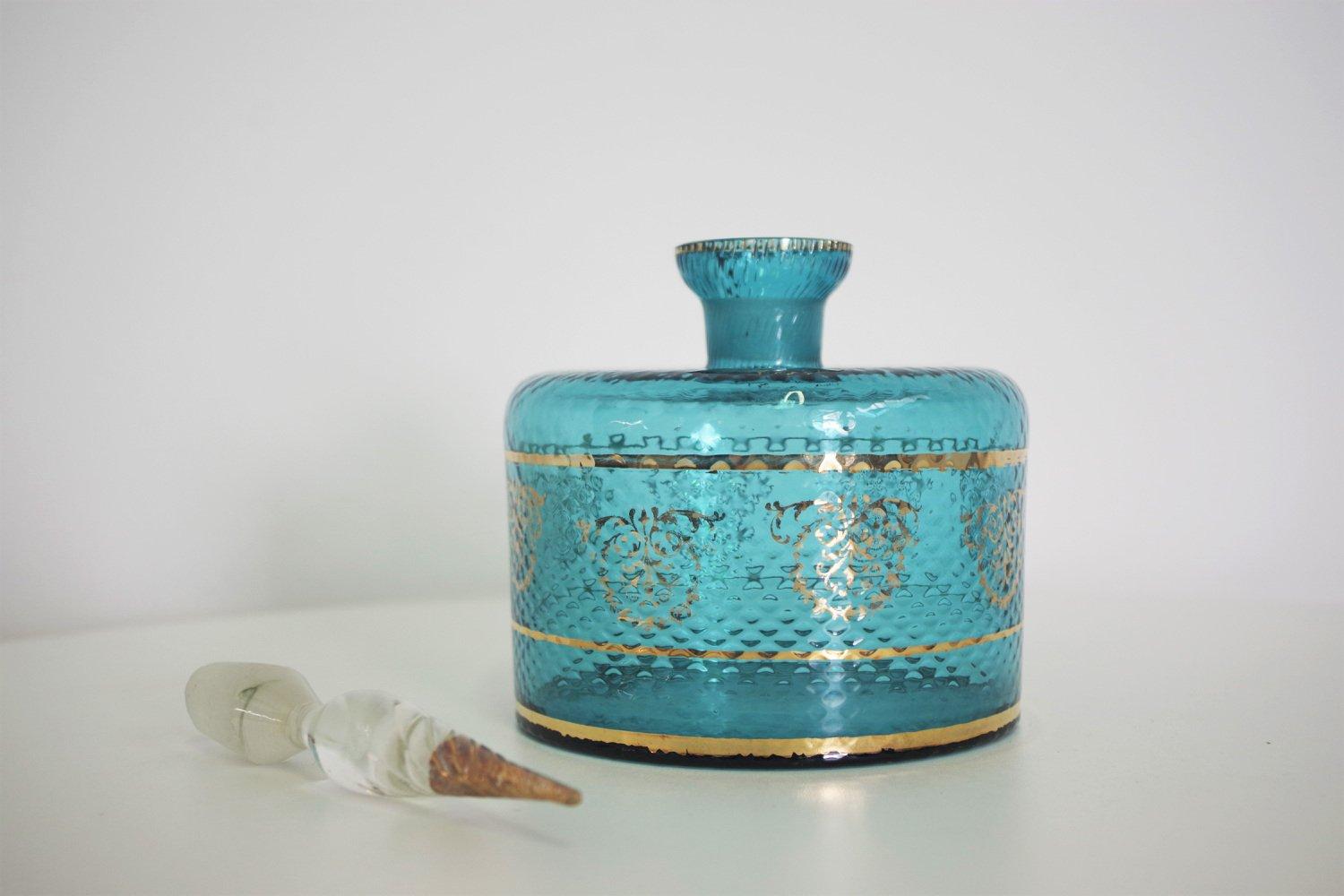 950s Glass and 24-Karat Gold Cognac Holder - Vintage Italian Barware

Add a touch of opulence to your bar collection with this rare 1950s Cognac holder, crafted in Italy and featuring luxurious glass with 24-karat gold accents. This stunning piece