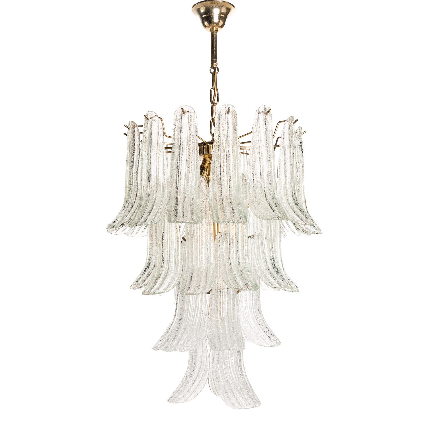 Classic and elegant design. Petal chandelier Inspired by the delicate petals of the Dahlia flower. Hand-blown, Selle Murano glass petals with very small pieces of broken glass merged to the back of the petal. Hanging from a three tier brass frame