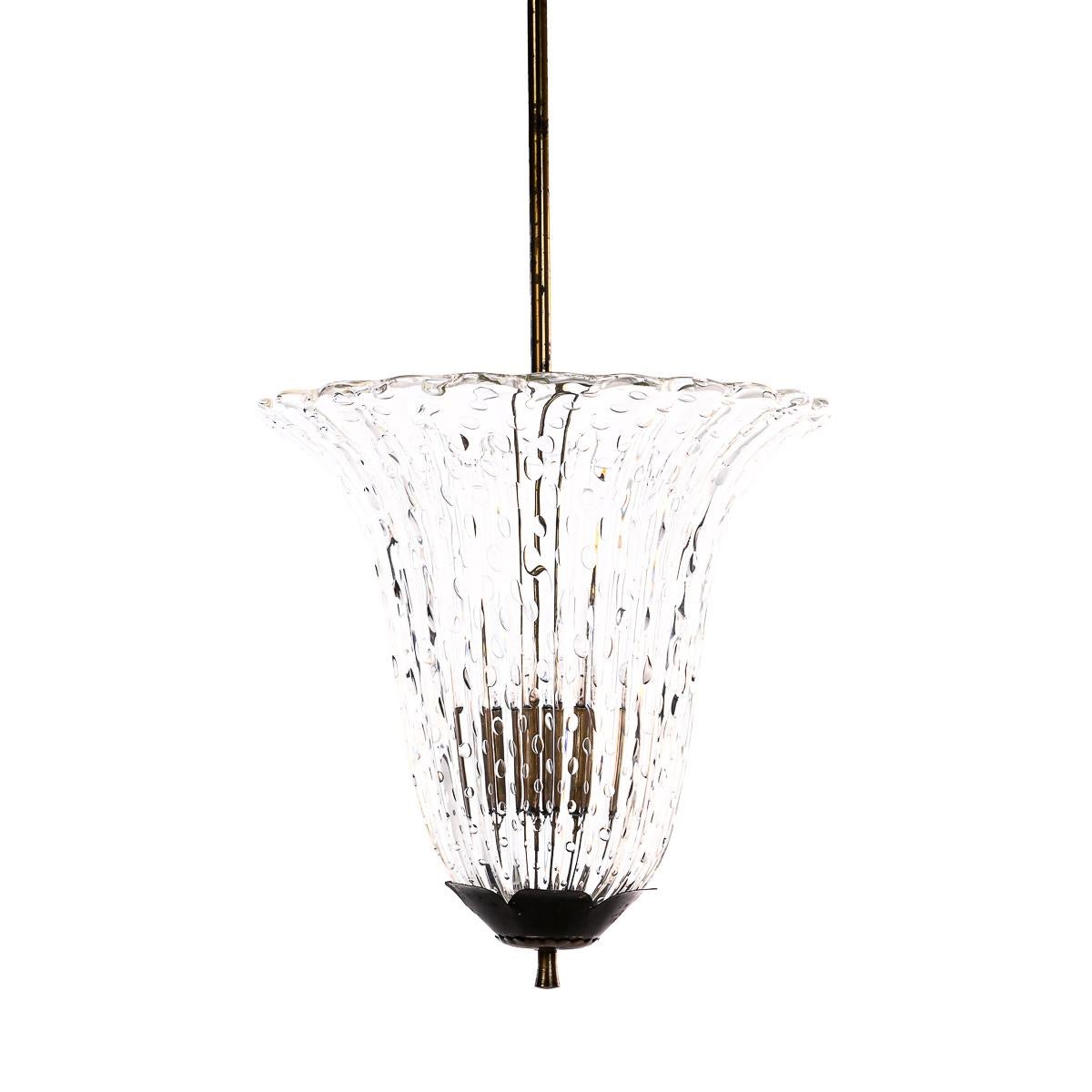 Elegant glass fase with air-bubbles. It holds three E14 lightbulbs.