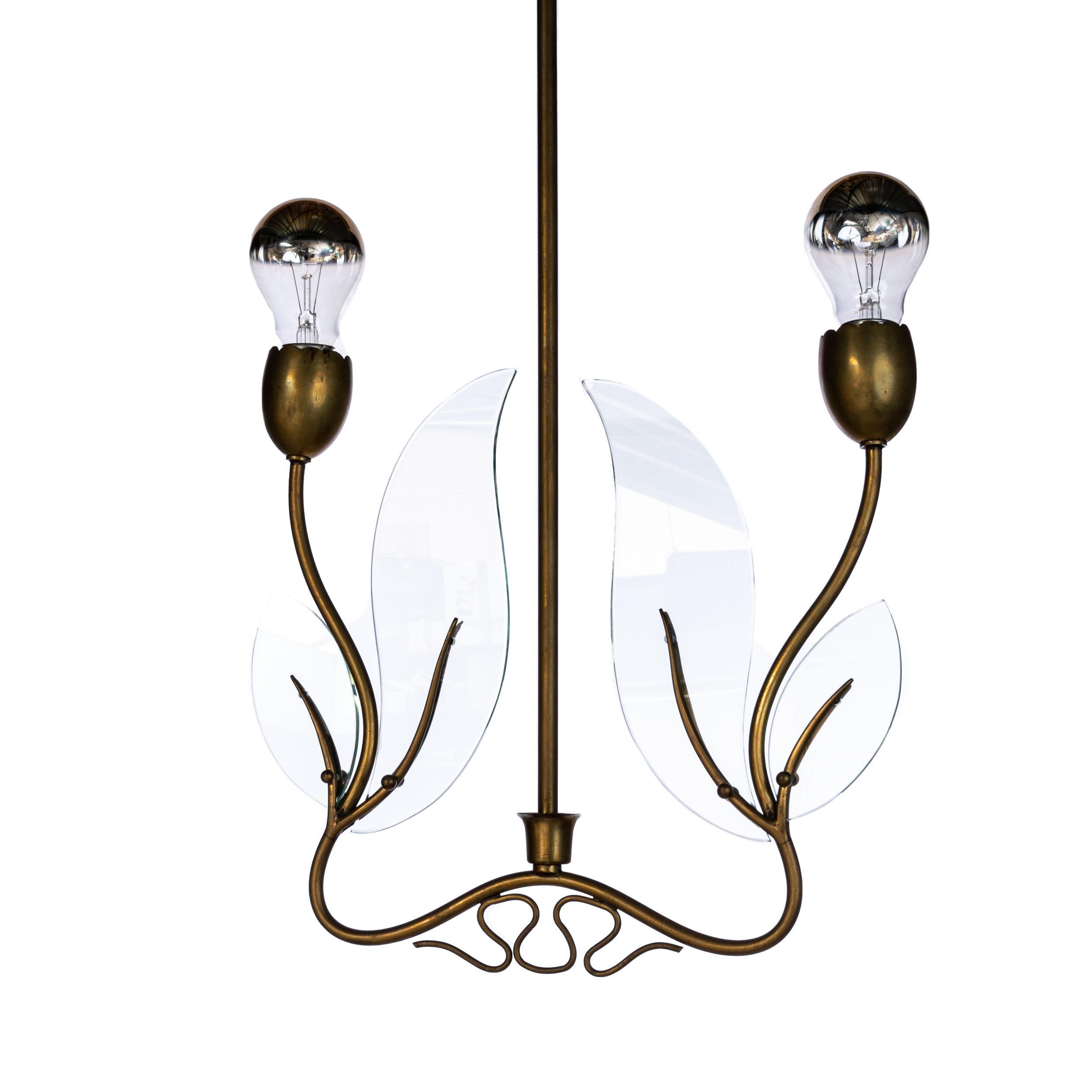 Elegant lantern in style of Fontana Arte. Consists of four glass leaves, a brass frame and two E27 sockets.
Glass panel 33cm width and 24 cm height. Two small chips in the corner of the panel.