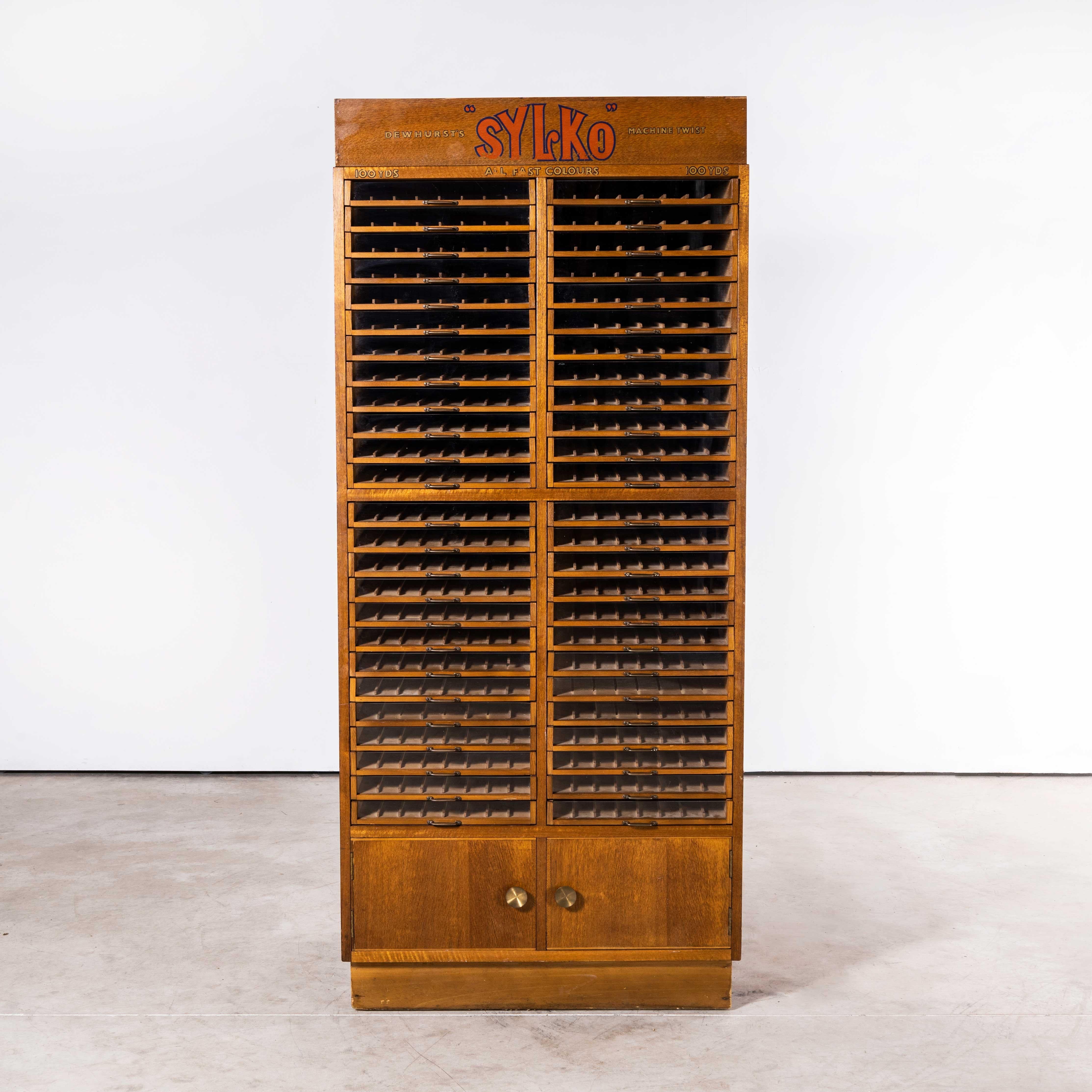 1950’s Glass Fronted Sylko Cotton Haberdashery Storage Unit – Fifty Drawers
1950’s Glass Fronted Sylko Cotton Haberdashery Storage Unit – Fifty Drawers. We recently salvaged a whole collection of original haberdashery shop cabinets from the original