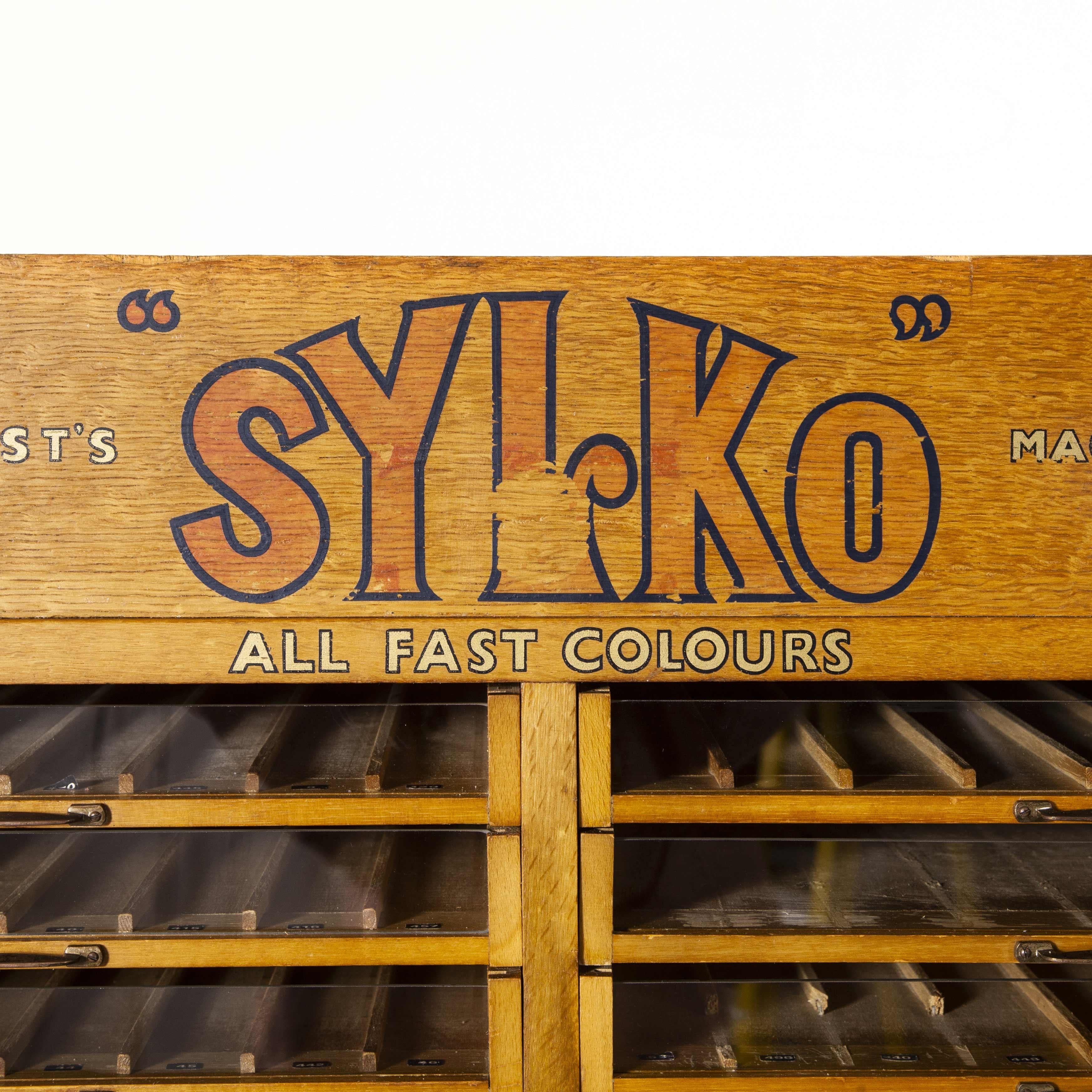 1950s glass fronted Sylko cotton haberdashery storage unit - fifty drawers. We recently salvaged a whole collection of original haberdashery shop cabinets from the original haberdashers in the north of England. This is the gem, totally original and