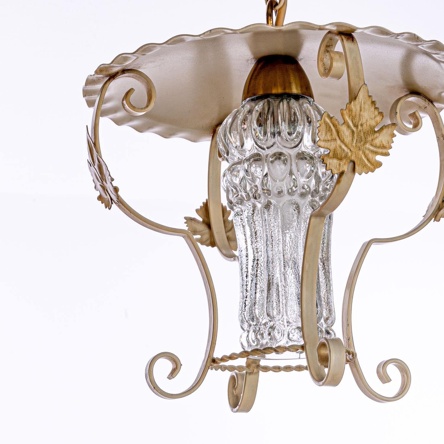 Lantern consists of thick glass ornament in the middle covering the E14 lightbulb, Finished off with a metal frame.