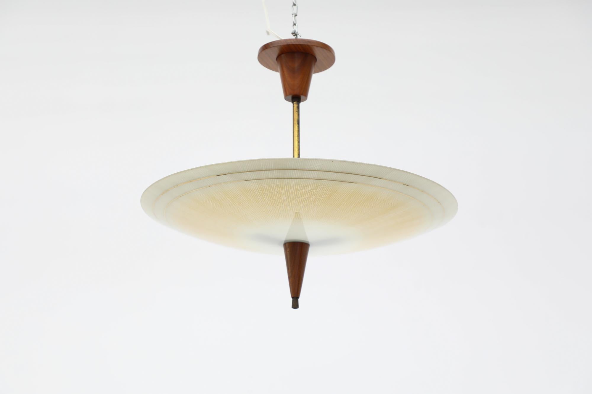 Dutch 1950s Glass Rondelle Ceiling Pendant with Patterned Glass, Teak & Brass Details For Sale