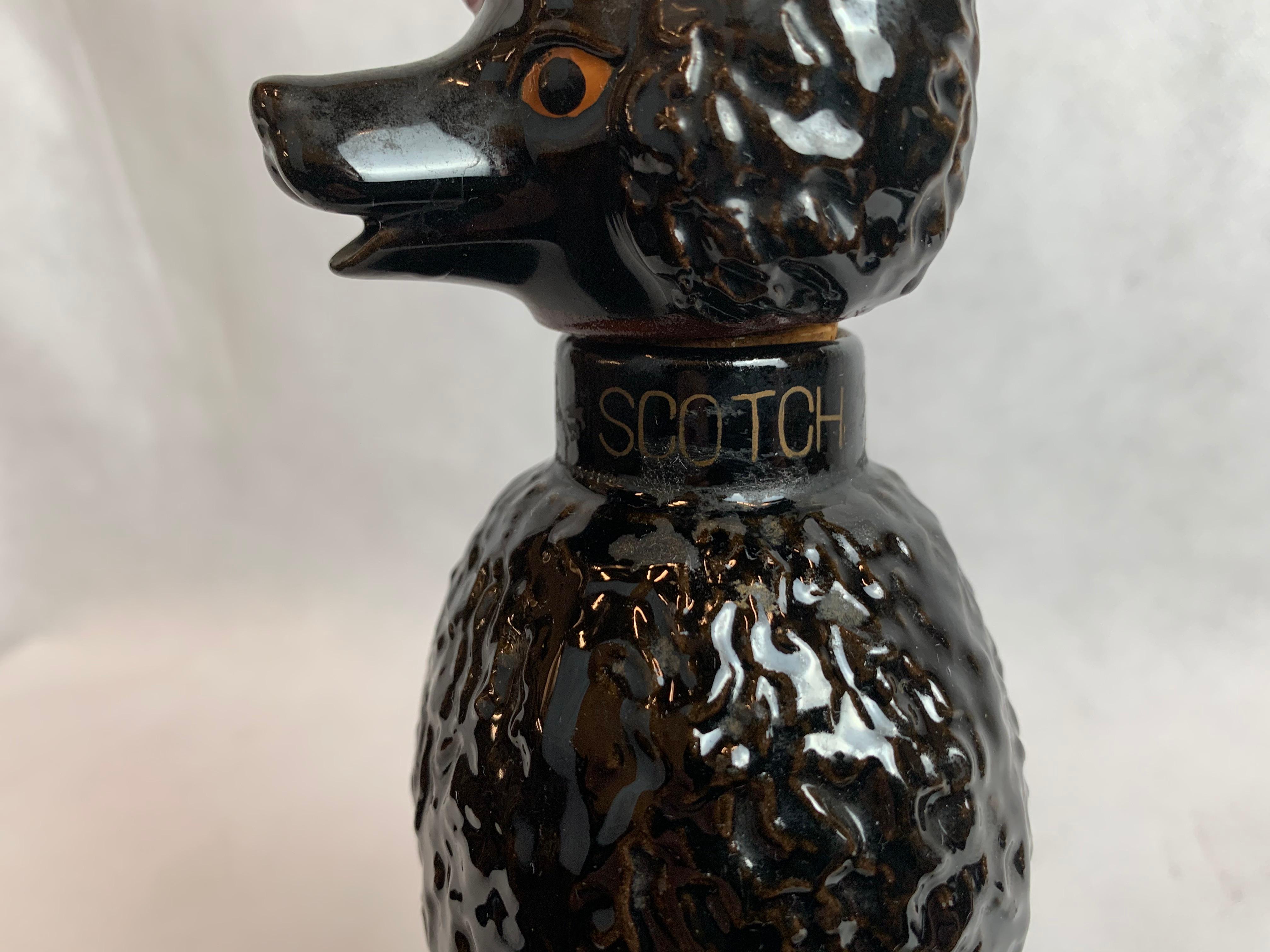 Ceramic Scotch Decanter in the Form of The Iconic 1950's  Black Poodle with Red Bow