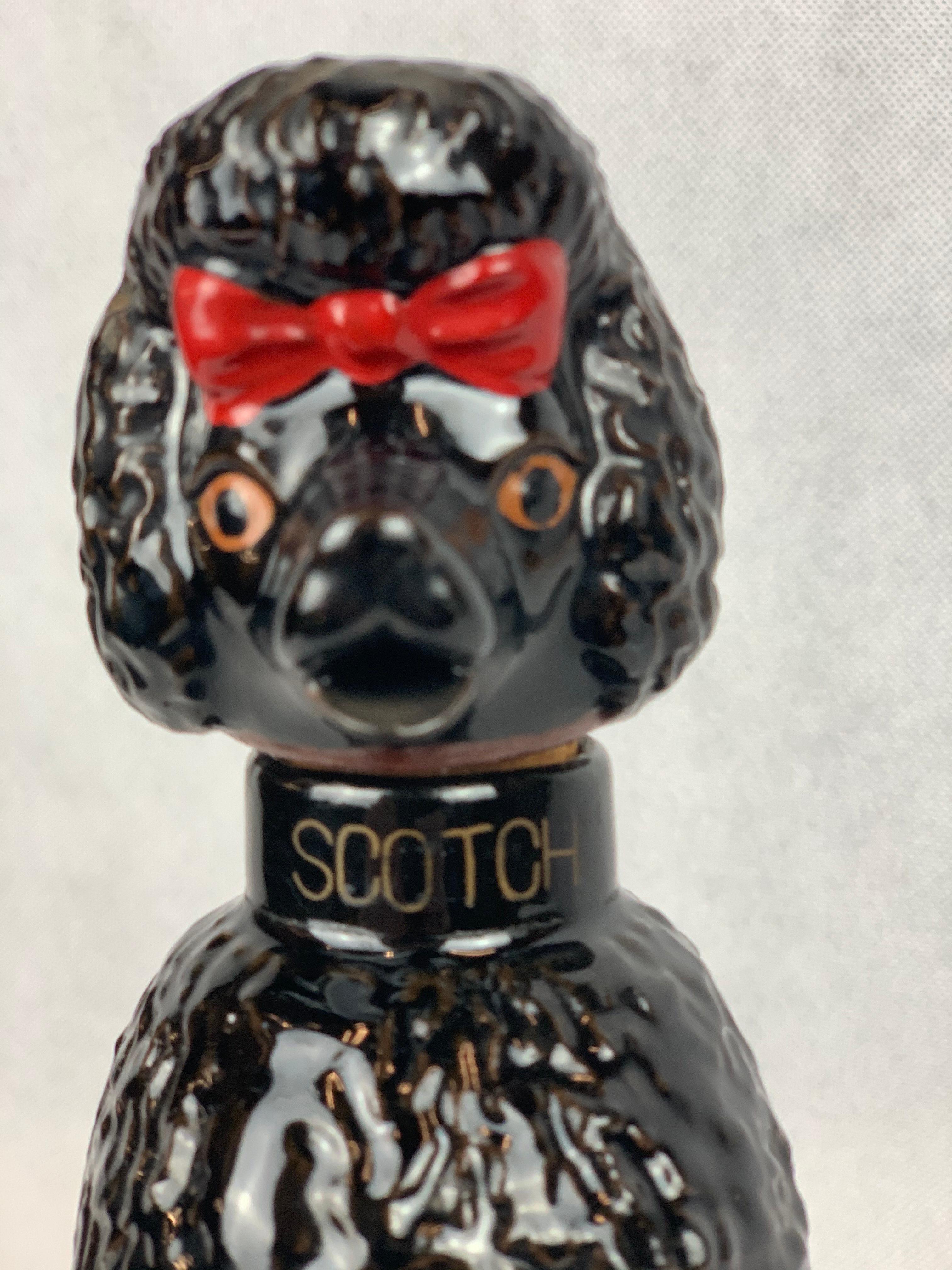 Scotch Decanter in the Form of The Iconic 1950's  Black Poodle with Red Bow 1