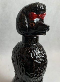 Scotch Decanter in the Form of The Iconic 1950's  Black Poodle with Red Bow