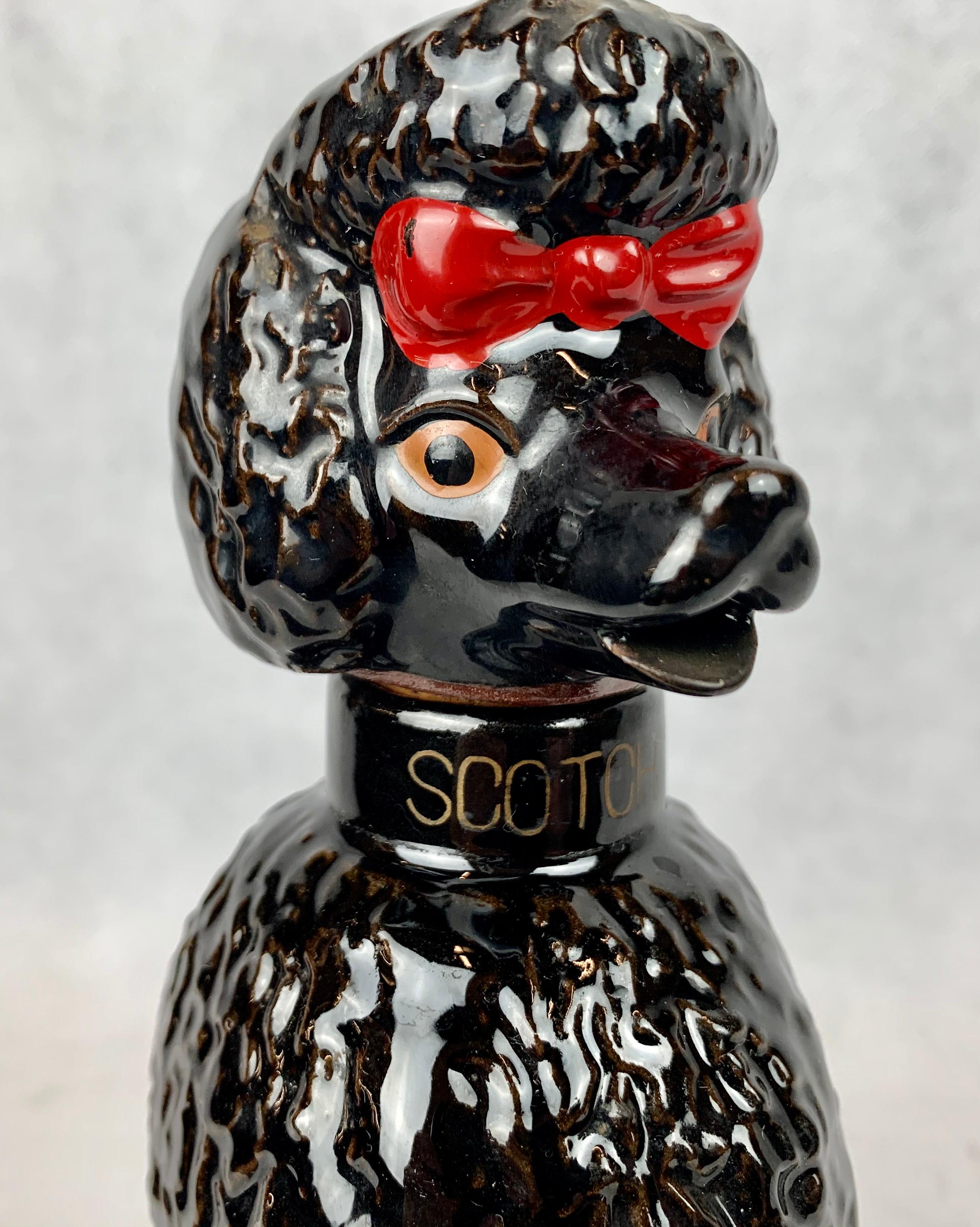 Mid-Century Modern Scotch Decanter in the Form of The Iconic 1950's  Black Poodle with Red Bow