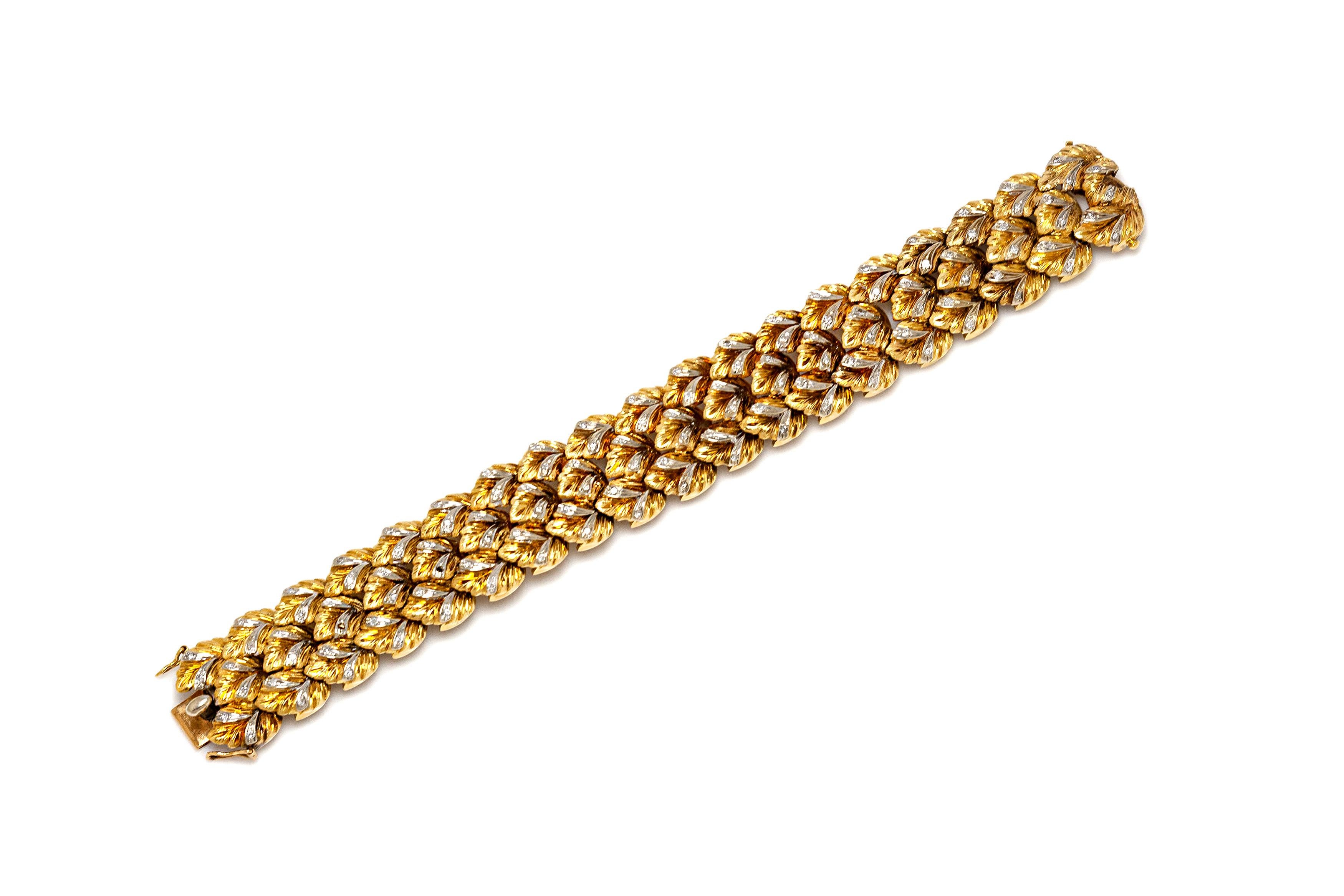 Bracelet, finely crafted in 18k yellow gold with diamonds weighing 39.9 dwt. Length of the bracelet is 7inch/18cm and the width is 0.75 inch/2 cm. Circa 1950's.