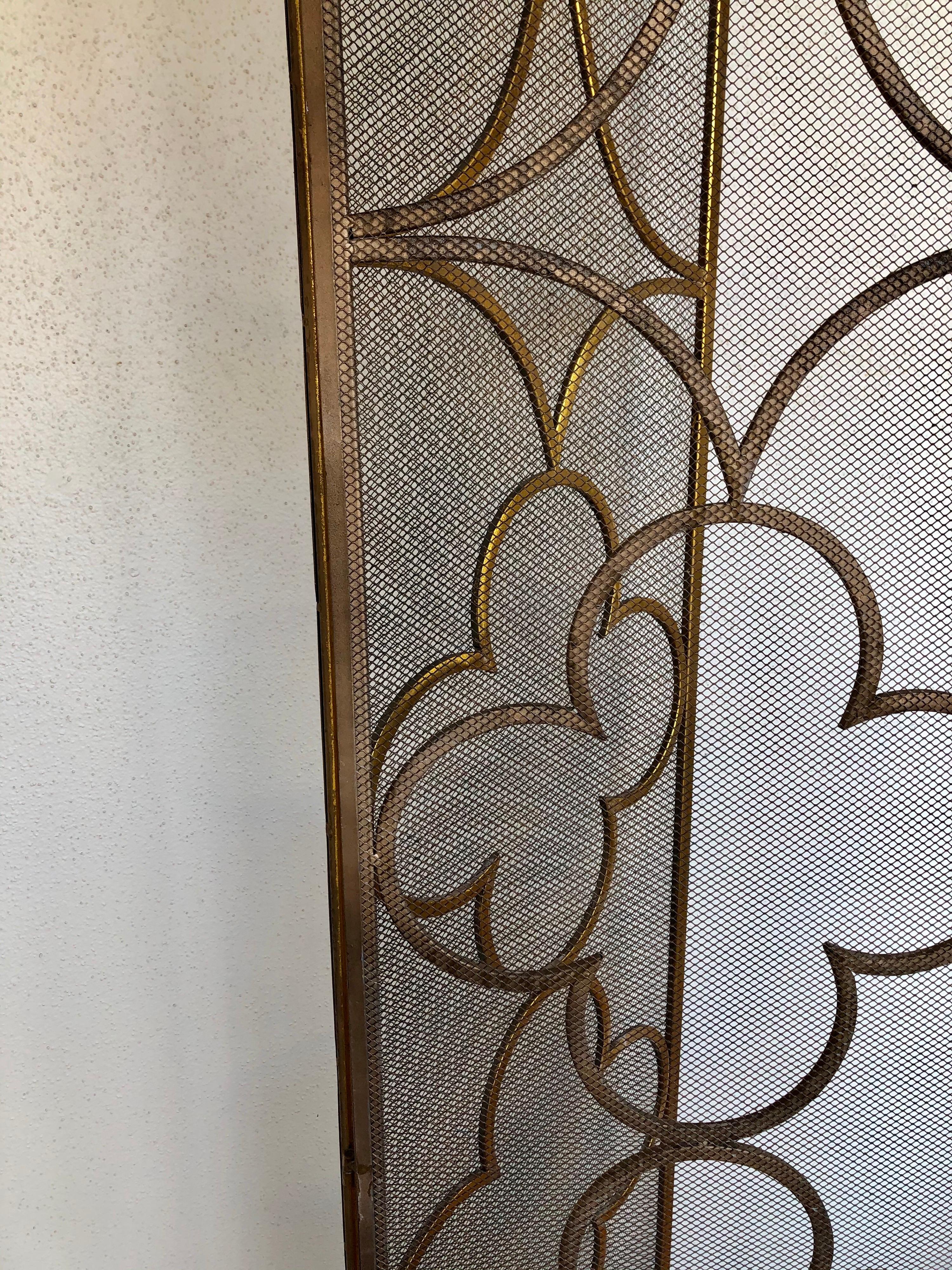 A beautiful 3-panel folding screen, in gold leaf finish over metal great design easy to move, each panel its 19' wide and 78.5