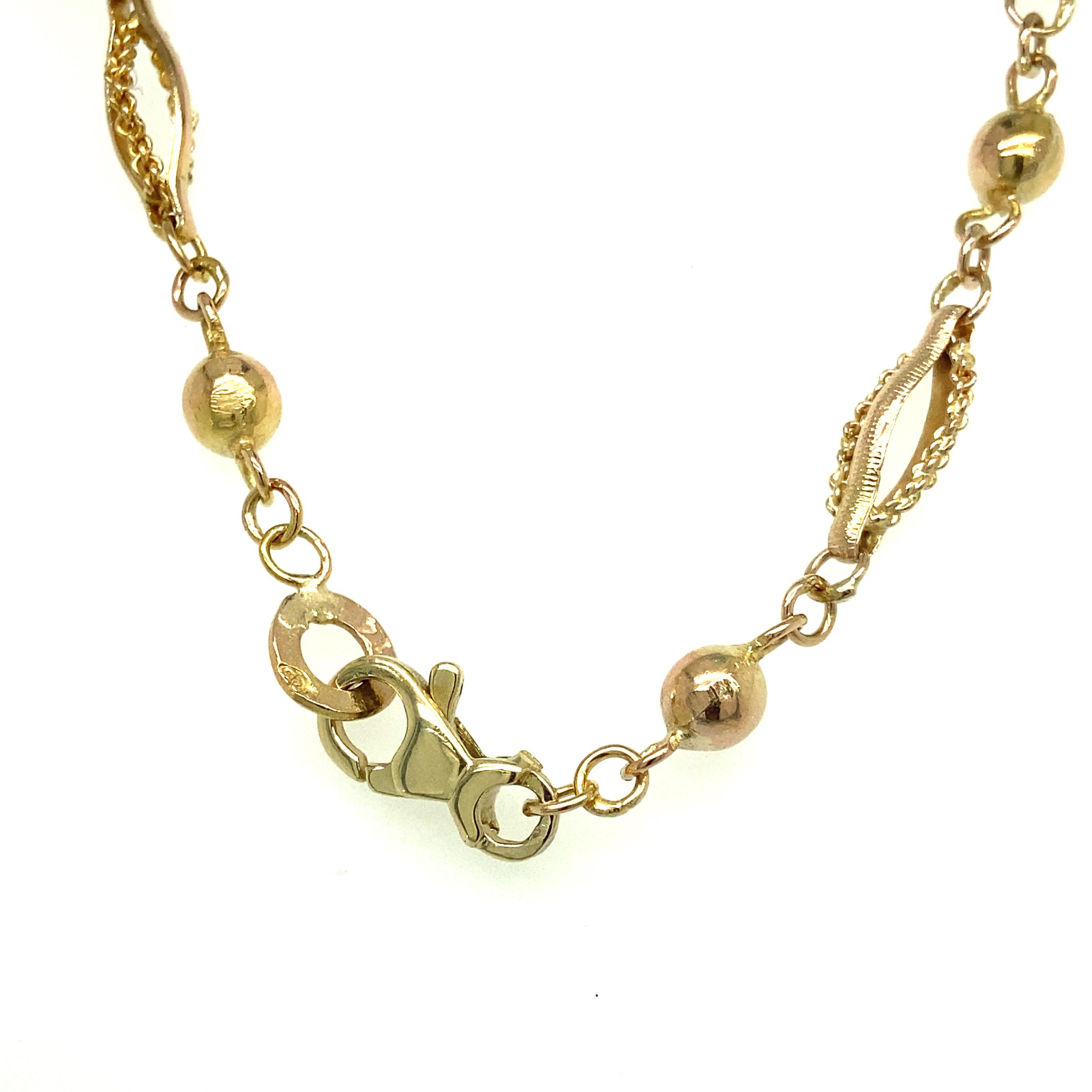 One 14 karat yellow gold estate necklace measuring 30 inches long complete with a lobster claw clasp.