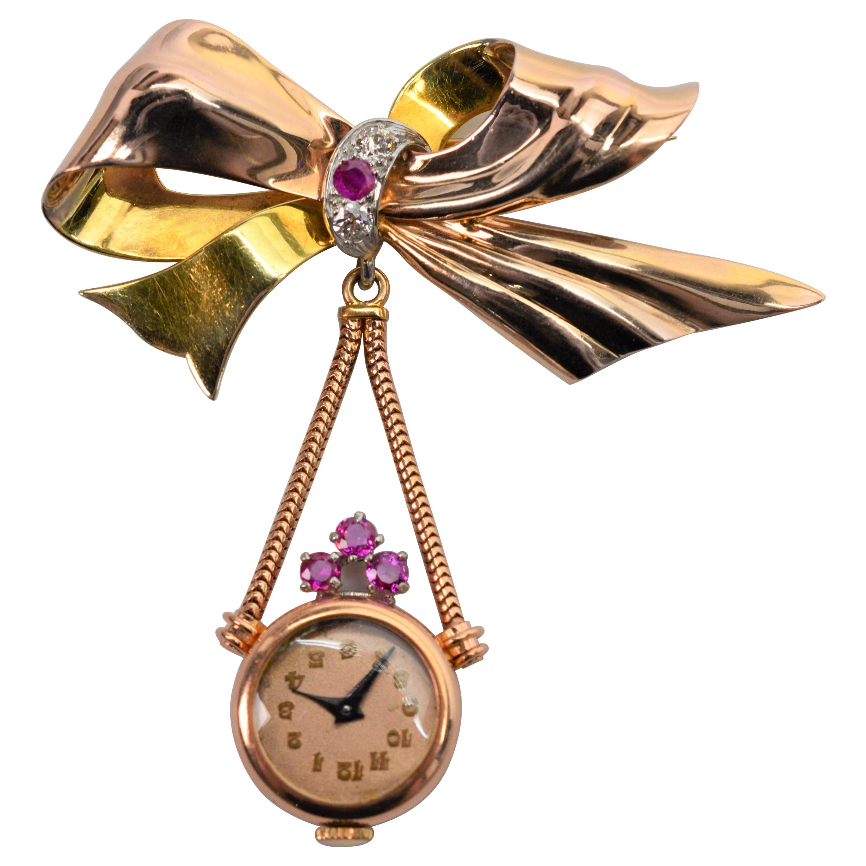 1950s Gold Pendant Watch Brooch with Rubies For Sale