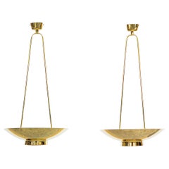 1950s Golden Brass Incredible Pair of Pendant Lamps by Paavo Tynell
