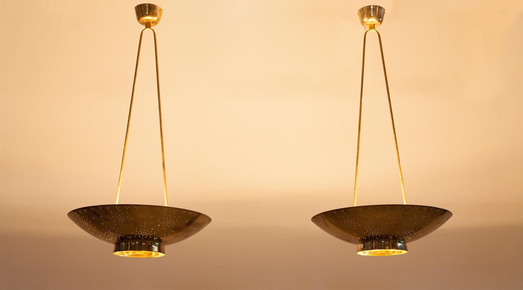 Etched 1950s Golden Brass Rare Pair of Pendant Lamps by Paavo Tynell 