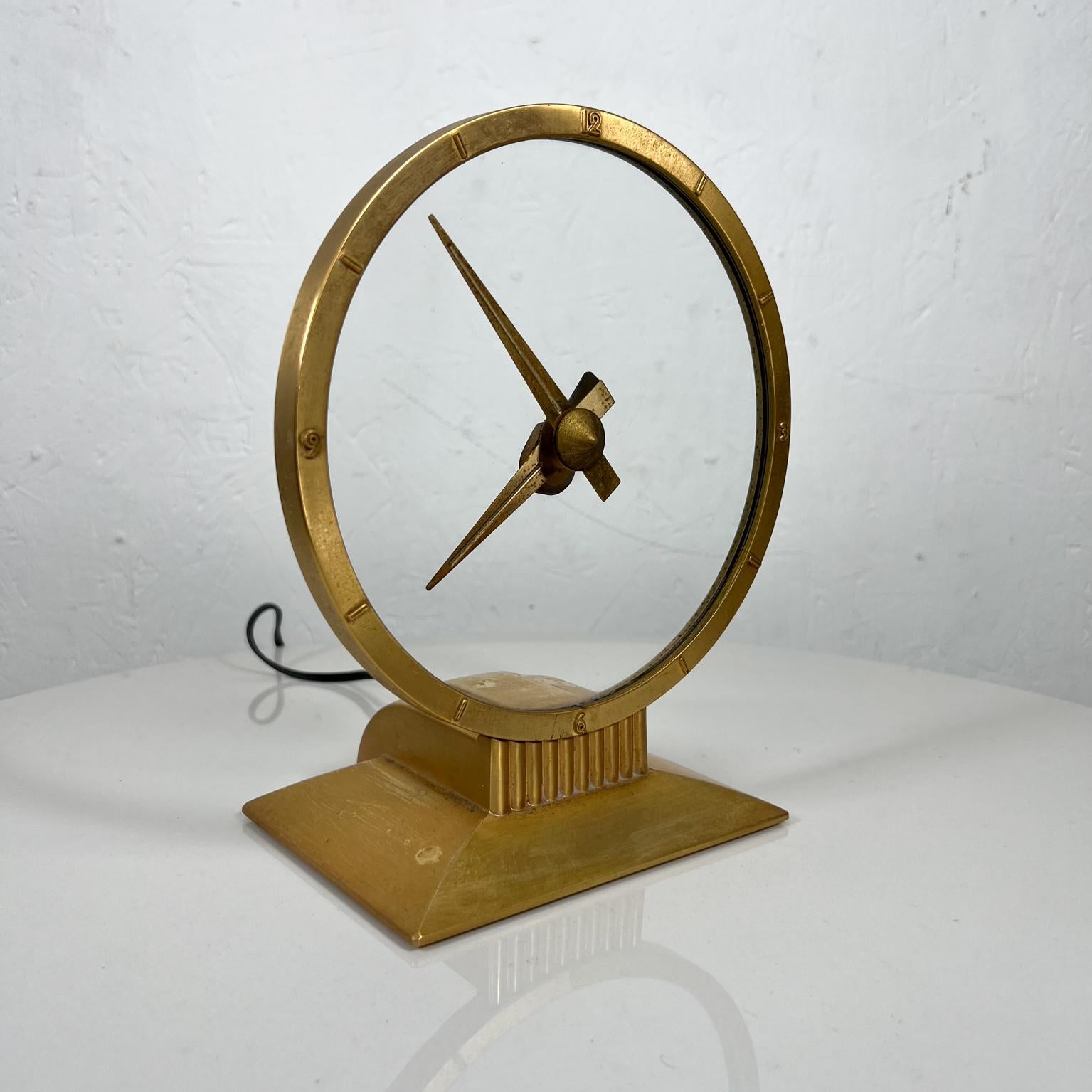 1950s Golden Hour Electric Clock made by Jefferson Electric Bellwood, Illinois
9 tall x 7.38 w x 4.5 d
Incorporates Art Deco Industrial and Mid-Century Modern Golden Hour Clock by Jefferson Electric Co.
The minute and hour hands appear to float over