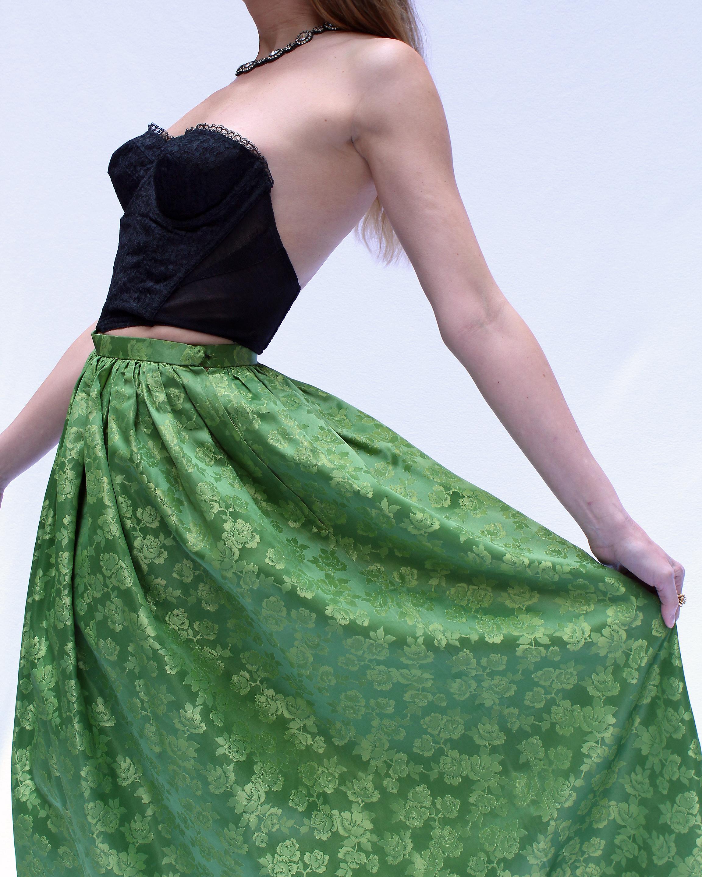 This vintage 1950s silk brocade ballskirt is a serious WOW moment, in the most vibrant shade of emerald green, one of my absolute favorite hues. It sits on the natural waist and features a gathered skirt, for the most magnificent swoosh. It was