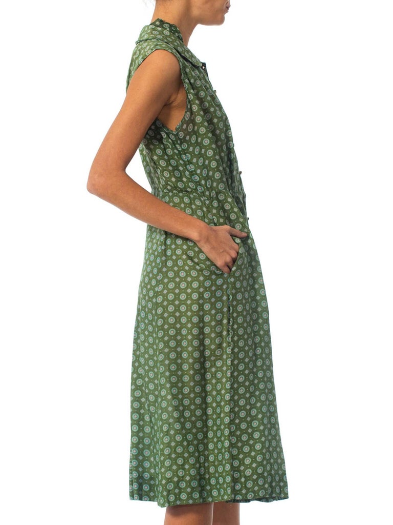 green nylon pinafore dress