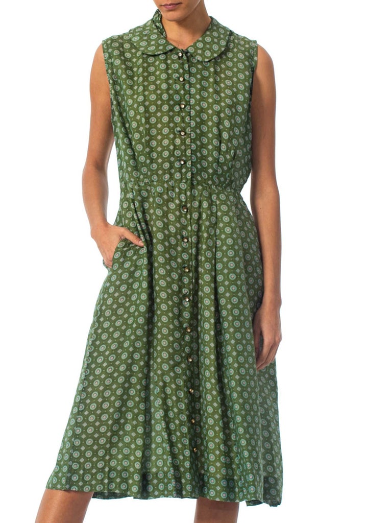 green nylon pinafore dress