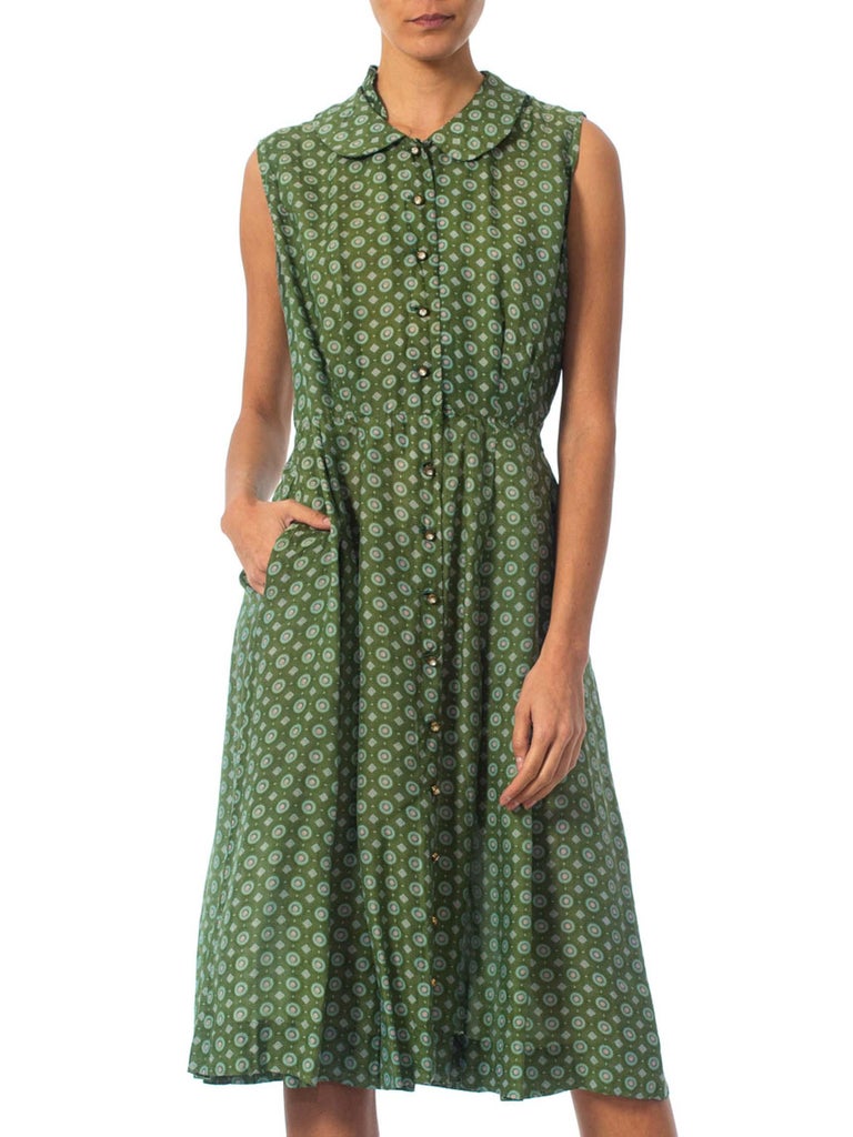 green nylon pinafore dress