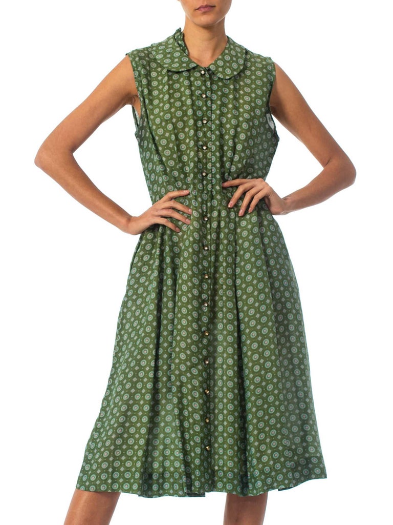 green nylon pinafore dress