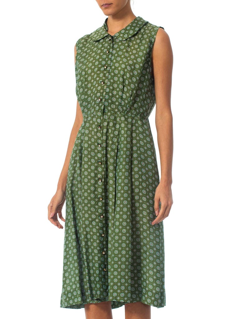 green nylon pinafore dress