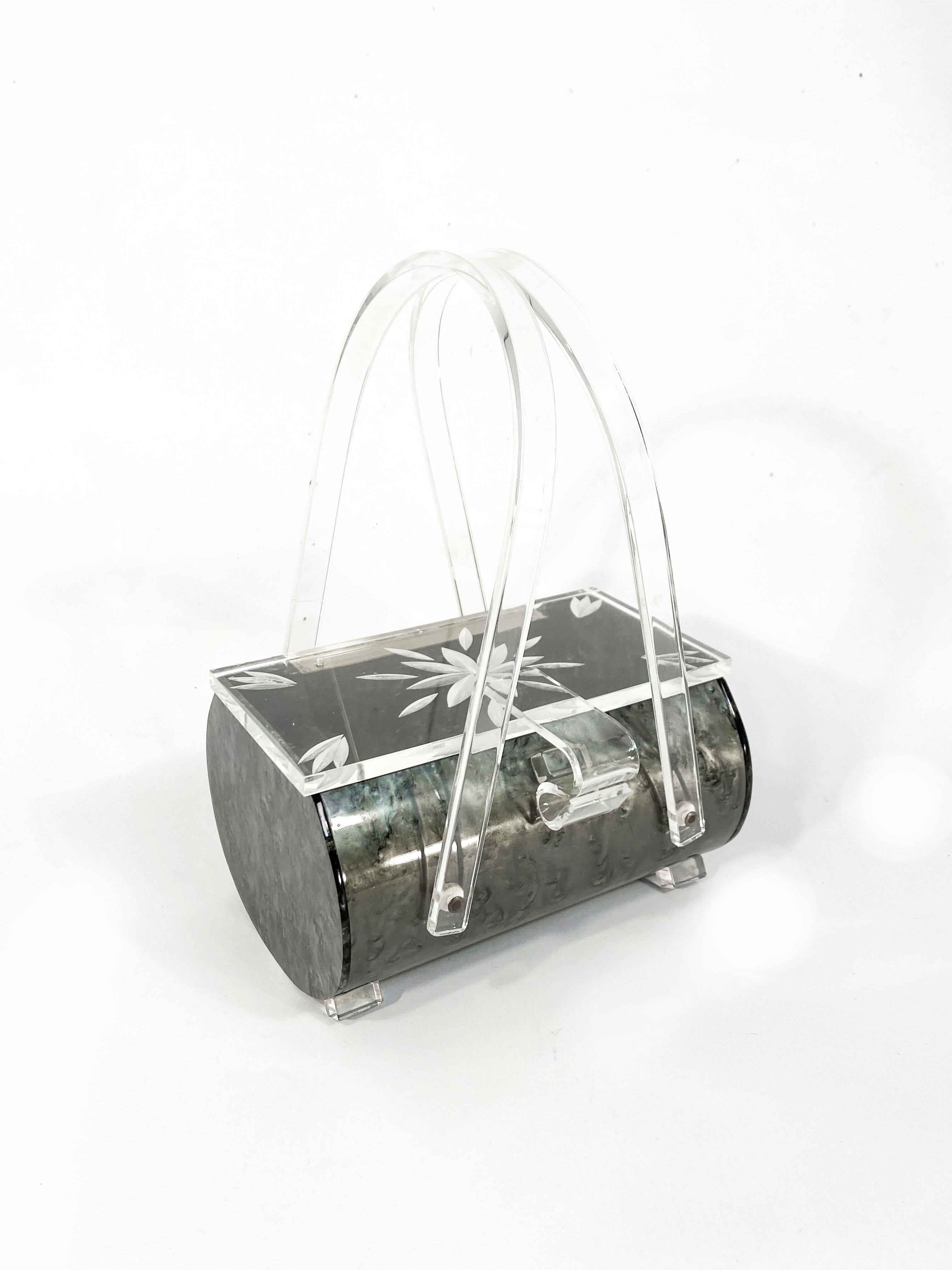 1950s Grey lucite handbag featuring a birds eye maple pattern with a clear etched lucite lid and clear double handles. 