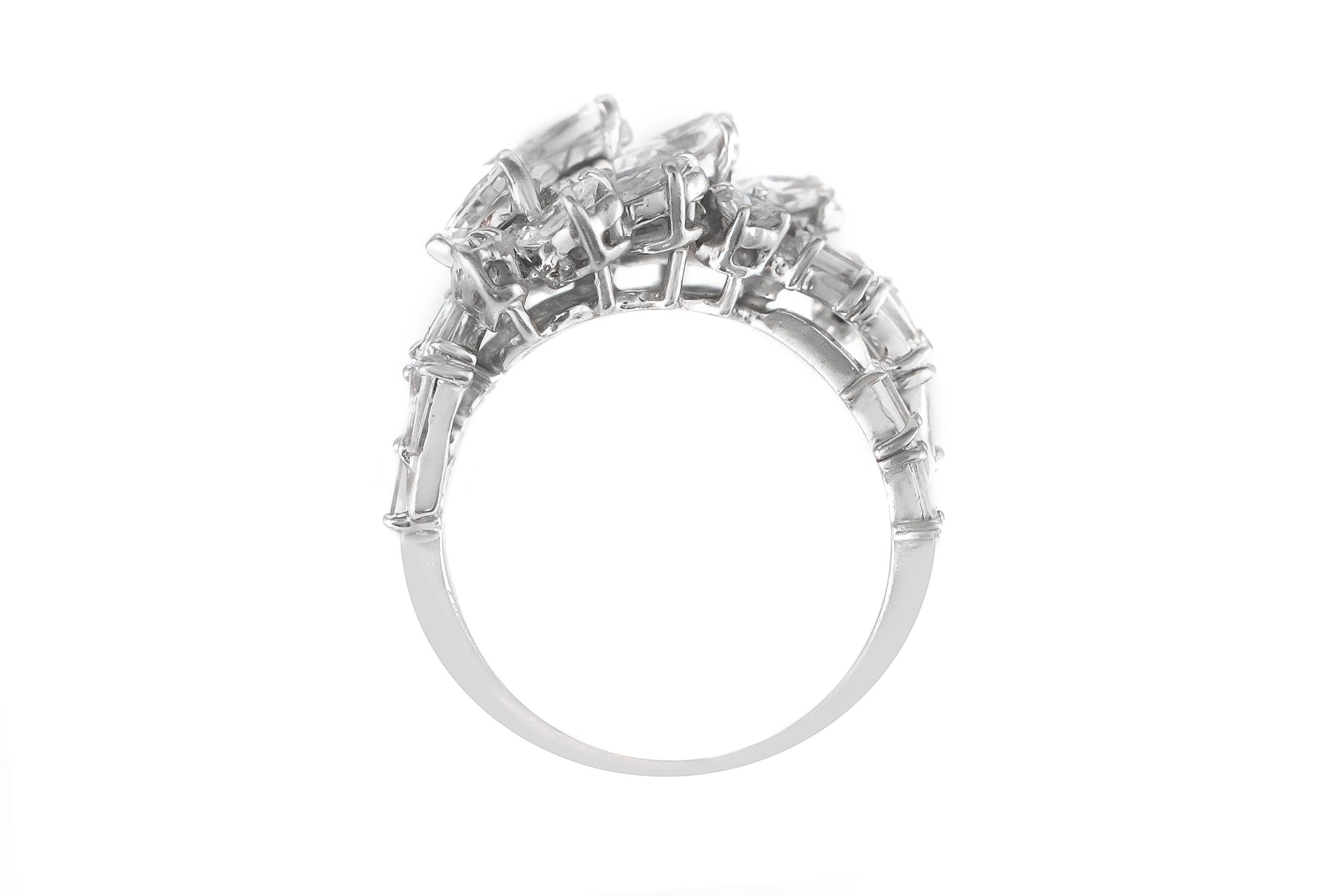 The ring is finely crafted in platinum with diamonds weighing approximately total of 2.25 carat.
Size 7.00 ( easy to resize )
Circa 1950.
