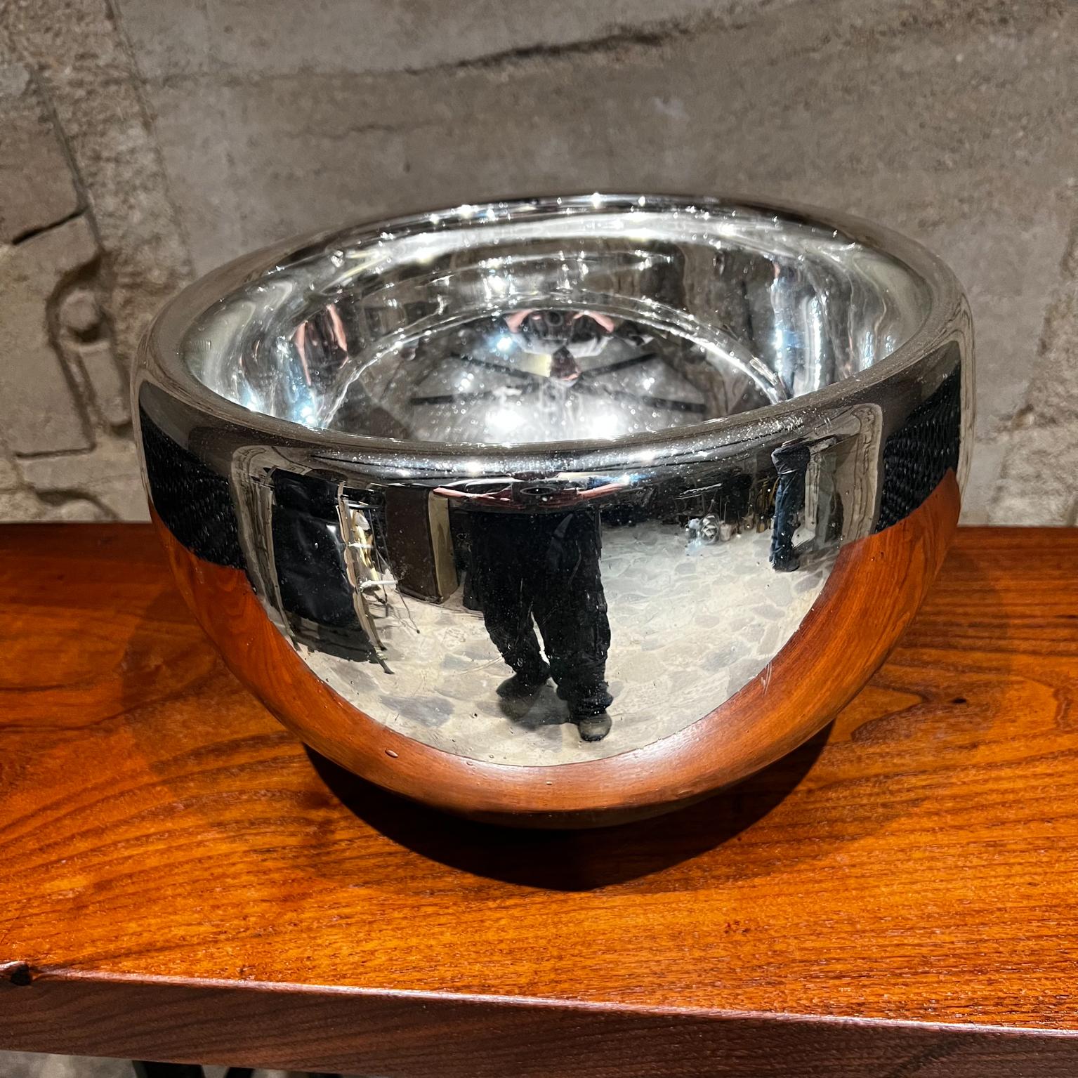 Fabulous hand blown mercury glass bowl made in Mexico, circa 1950s.
Ideal as catch all, fruit etc. decorative art.
In the style of Luis Barragan.
 Measures: 7.5 tall x 12.
Preowned vintage condition.
Please refer to all images.
