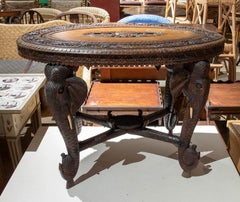 1950s Hand-carved Wooden Indu Table with Elephant Legs and Floral Motifs
