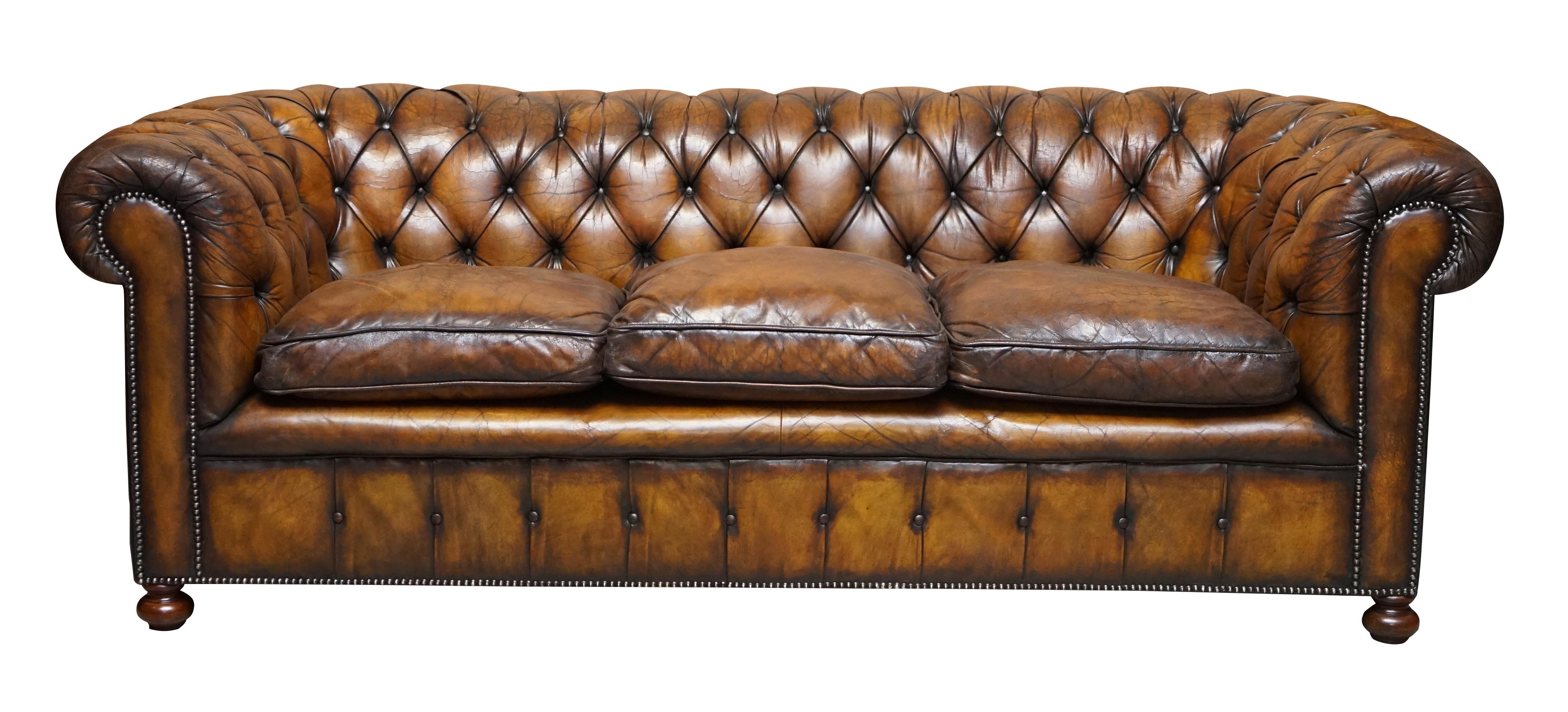 We are delighted to offer for sale this exceptionally rare original 1950s cigar brown leather chesterfield club sofa in restored condition with feather filled cushions 

This is a very rare find, you almost never come across mid 20th century