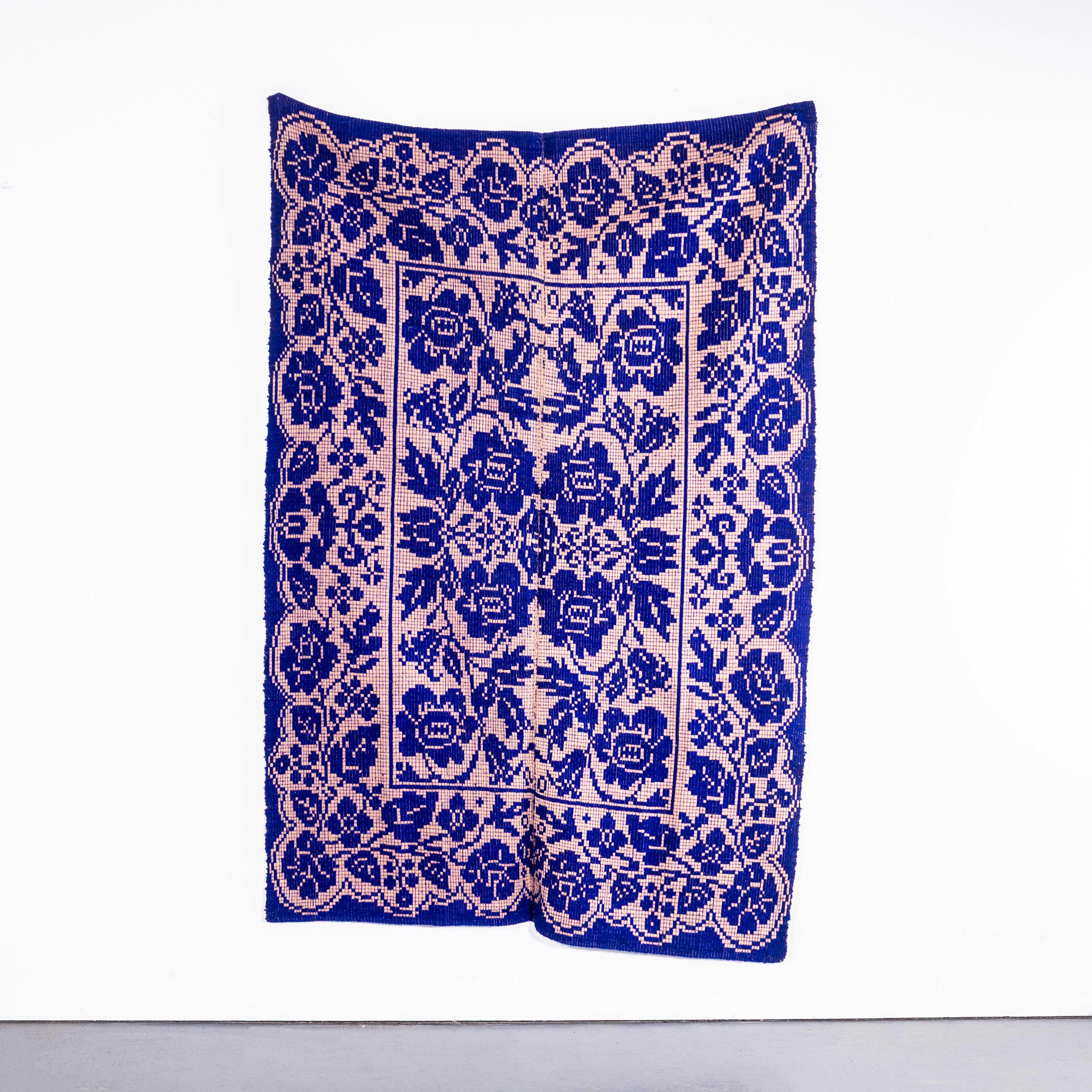 1950’s Handmade Blue & Faded Pink Folk Hungarian Wool Bedspread. 

We have been collecting these for some time, they are hard to find and very beautiful. We have a number of blankets often of similar designs, all woven by hand in simple traditional