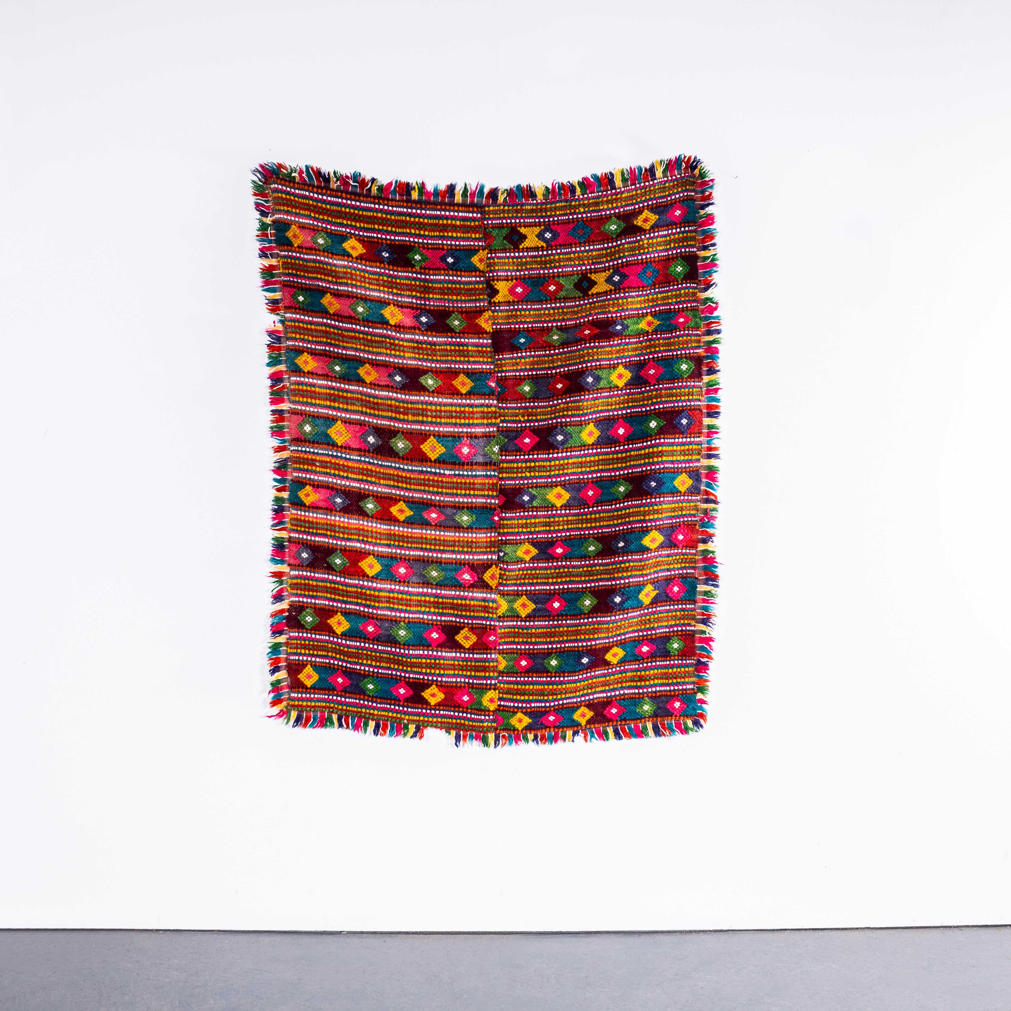 1950’s Small Handmade Rainbow Folk Hungarian Wool Bedspread. 

We have been collecting these for some time, they are hard to find and very beautiful. We have a number of blankets often of similar designs, all woven by hand in simple traditional