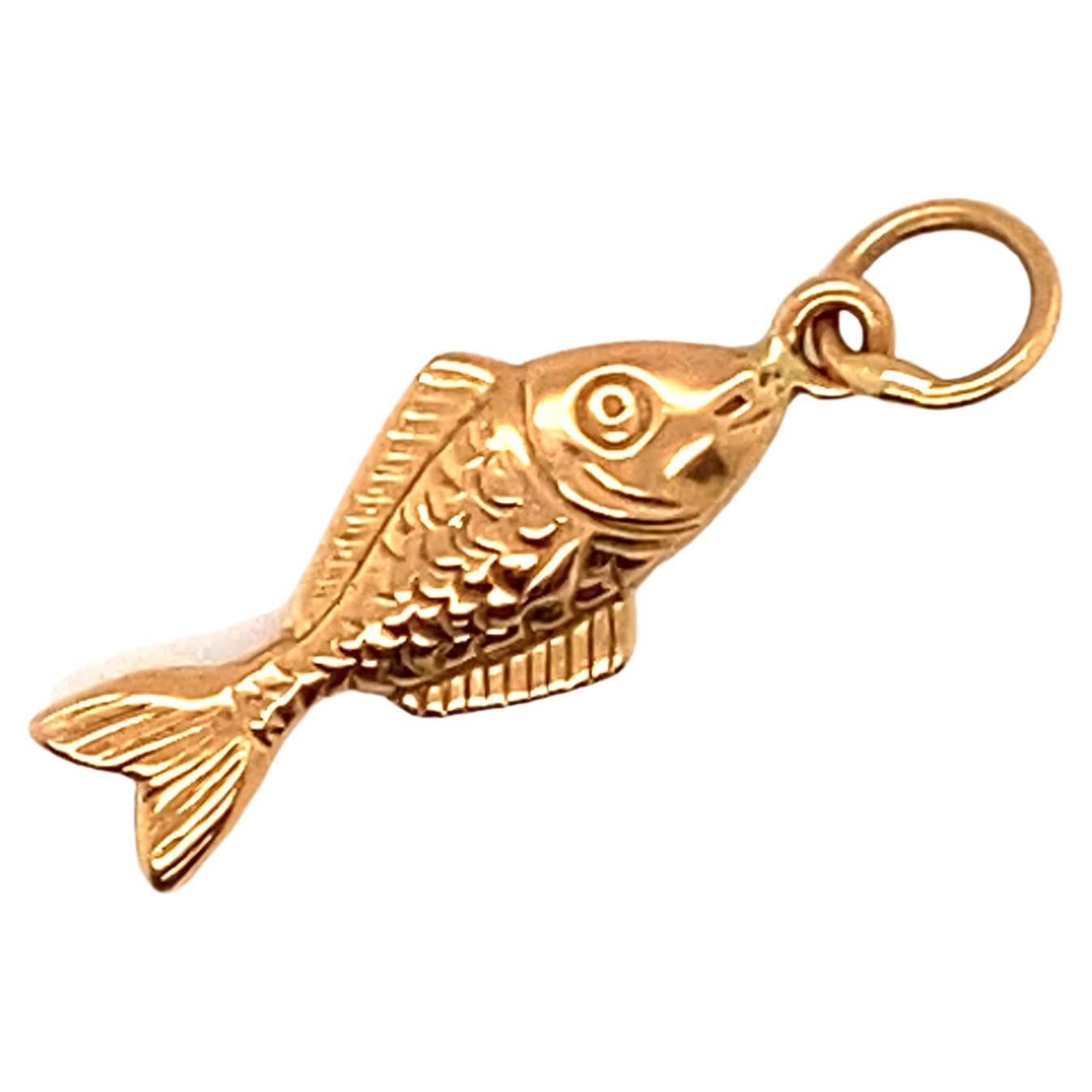 1950s Hanging Fish Angler Charm set in 14 Karat Yellow Gold For Sale