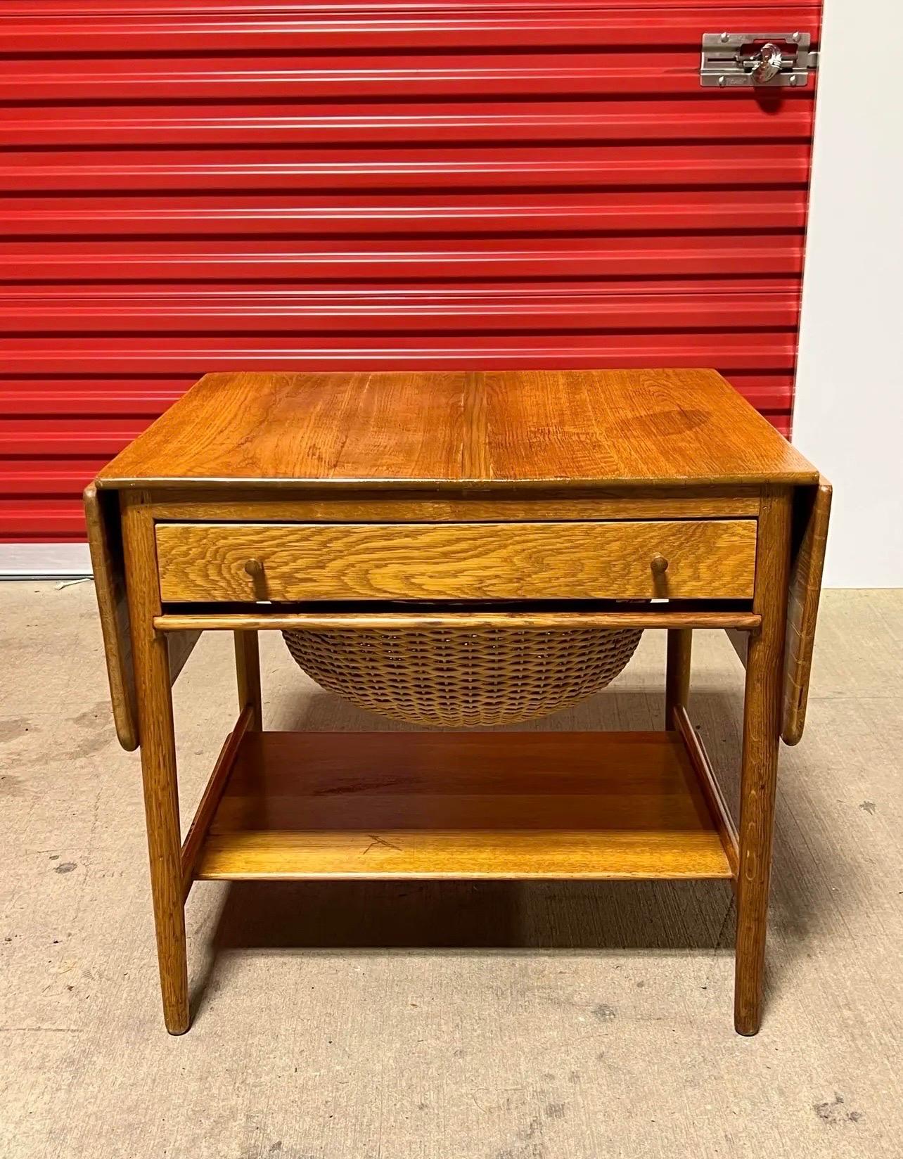 This exquisite, all-original side table, designed by Hans Wegner for Andreas Tuck, is a rare find that's truly hard to come by. It is marked beneath as shown in photo