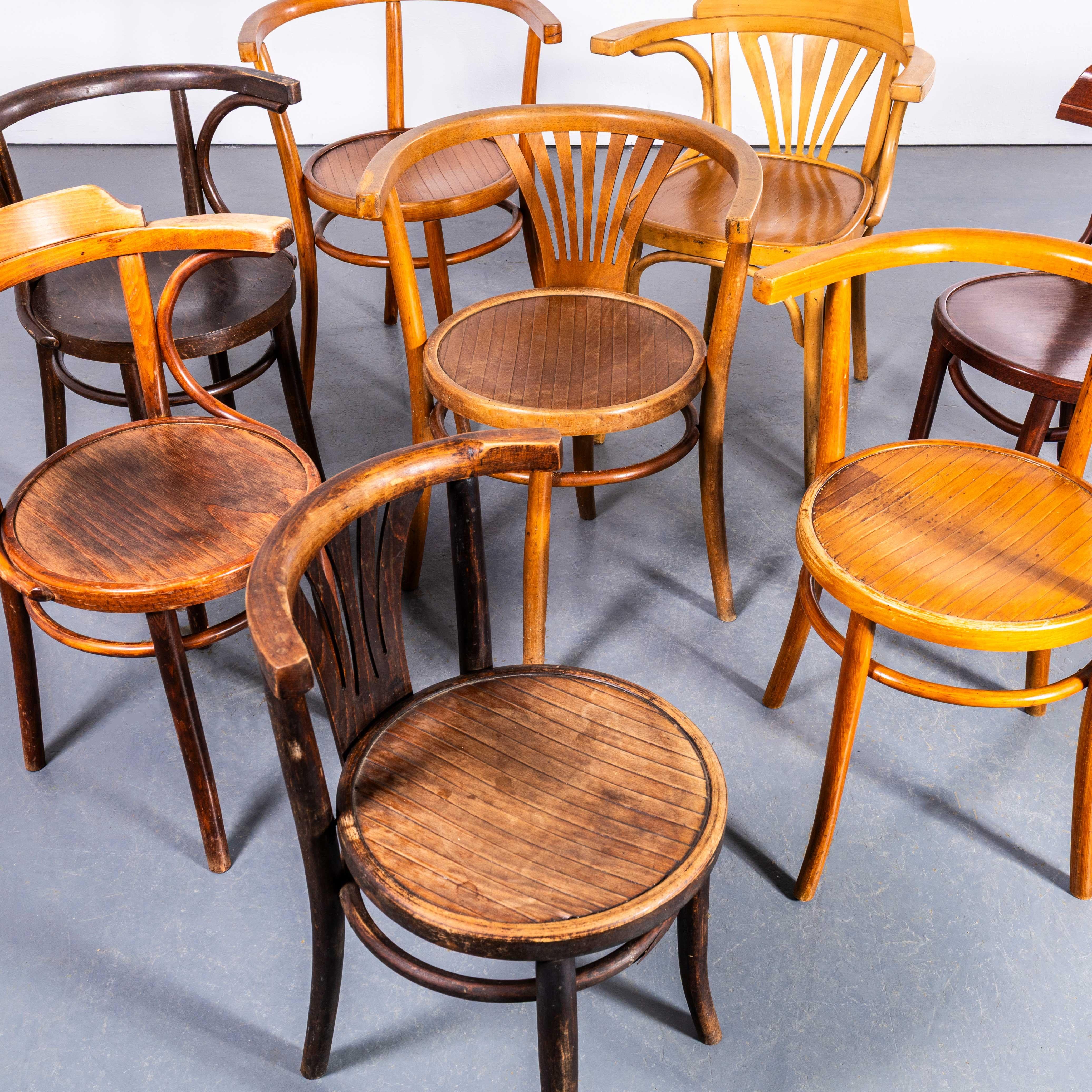1950’s Harlequin Mixed Bentwood Pub Armchairs – Set Of Eight. 

The listing is for a harlequin set of mixed armchairs made from the odd chairs left over from split sets, intakes of large batches and so on. Most are by the Hungarian producer