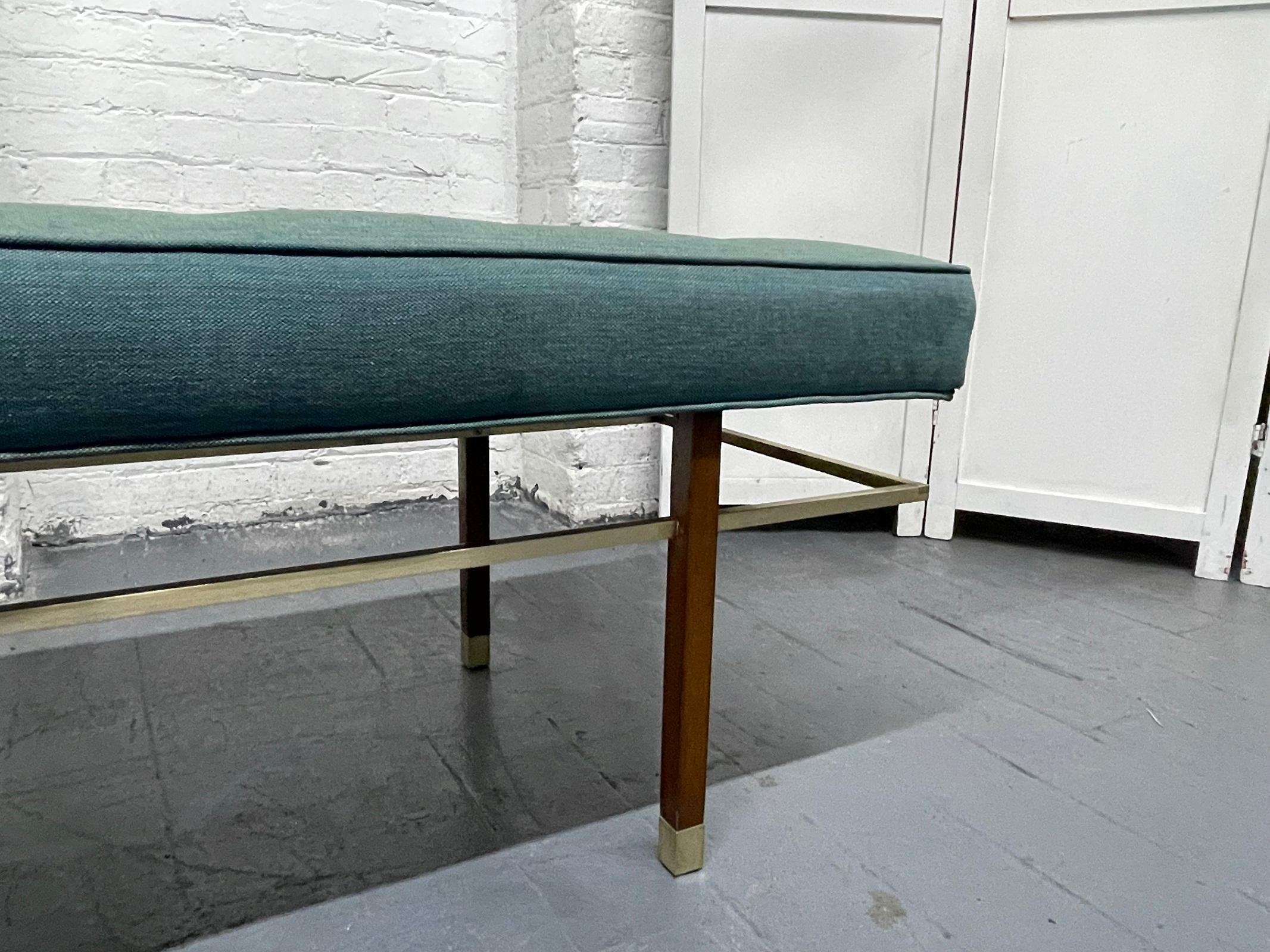1950s Harvey Probber tufted bench. The bench has floating brass stretchers, mahogany legs and the original fabric.
As a reference, the bench is photographed in Harvey Probber catalogue, published 1950s.