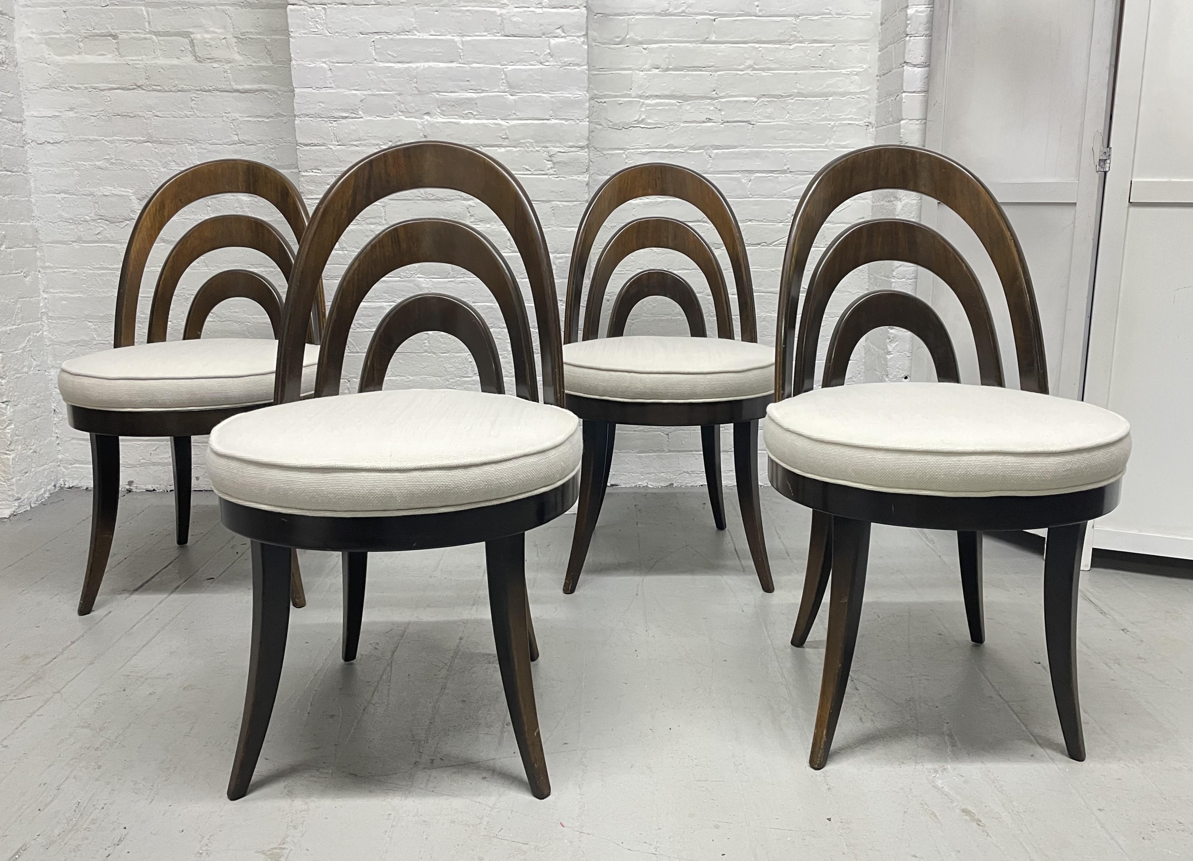 1950s Harvey Probber dining chairs. Nicely designed chairs with curved backs, splayed legs and newly fabric covered cushioned seats. Mahogany frames.