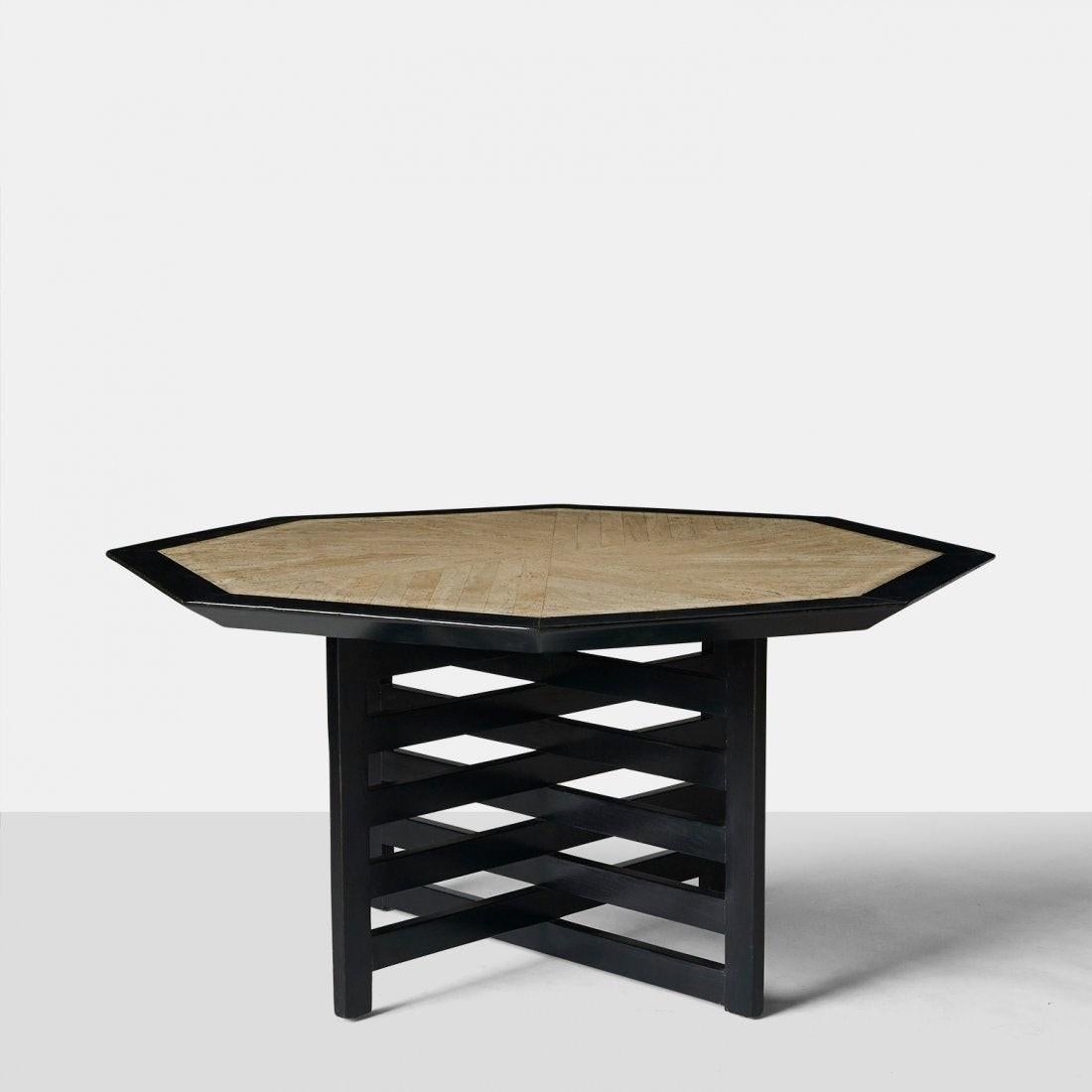 Bold, geometric dining or game table designed and manufactured by Harvey Probber for Modern. With cross-hatching legs and an octagonal top of travertine outlined by a thick beveled edge in ebonized finish. 

Literature: A 1957 publication: