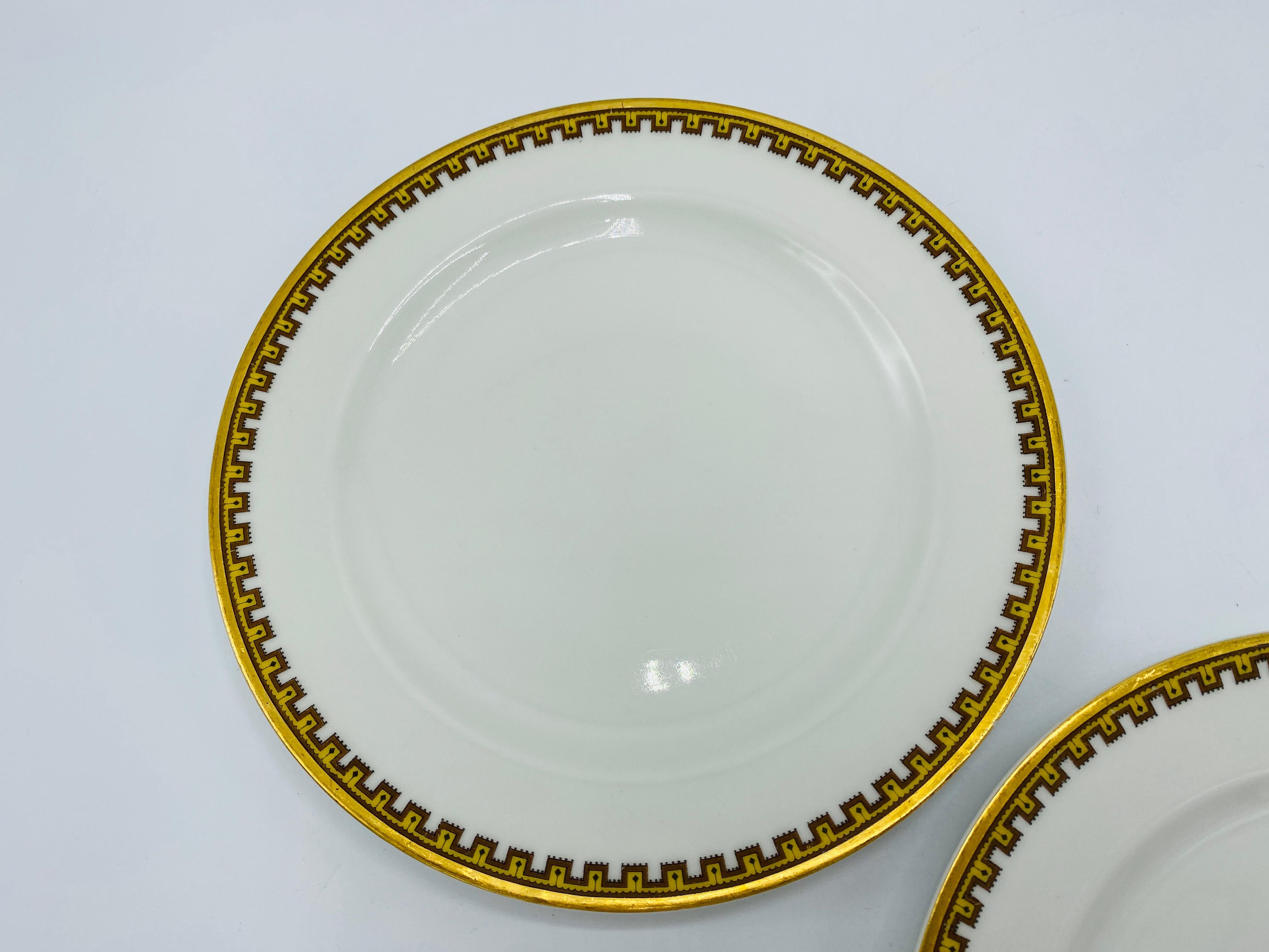 Listed is a stunning, set of 5, Haviland & Co. for Limoges France plates, circa 1950s. The set is in the highly sought after 'Schleiger 962 - H SCH962' Greek key geometric pattern. An elegant and sophisticated china pattern, with golden yellow and