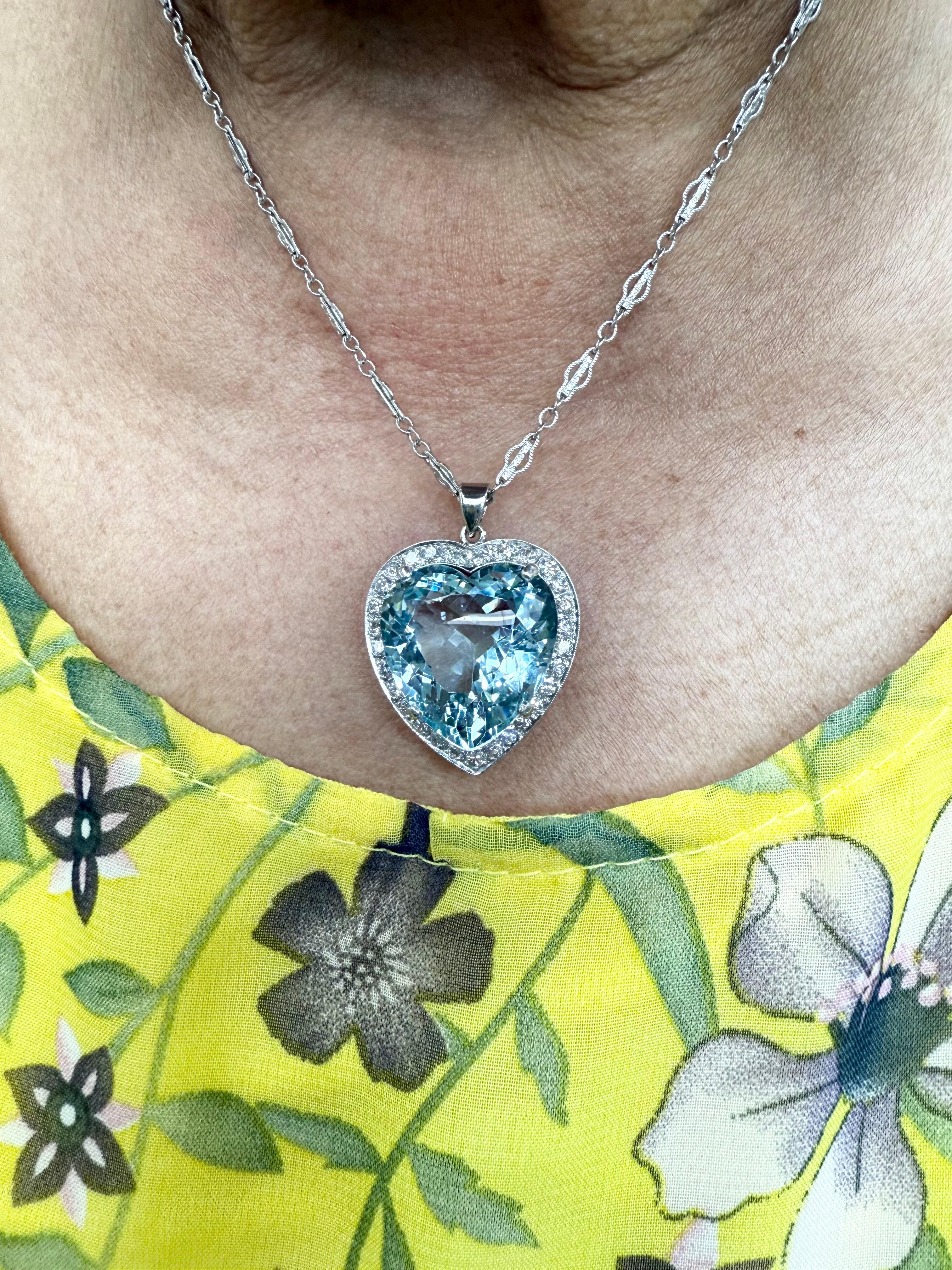 1950s Heart Shape Aquamarine Diamond Platinum White Gold Pendant Necklace.

This amazing Heart Shape Aquamarine and Diamond platinum and white gold pendant from the 1950s will make your heart flutter.  The pendant is over 1