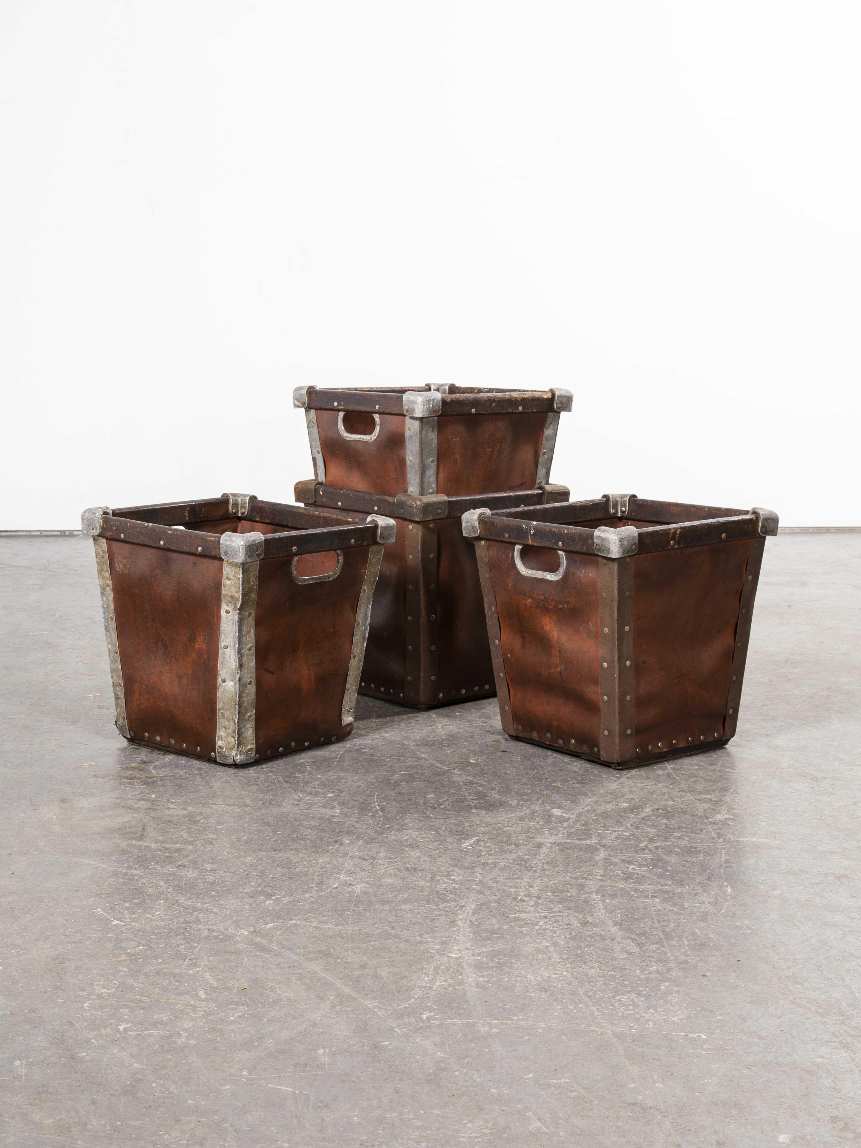 1950s heavy duty vulcanized card industrial crates. Vulcanized card was the material of choice for heavy duty practical industrial tote crates. Suroy was the market leader but they were one of many producers. These crates have riveted construction