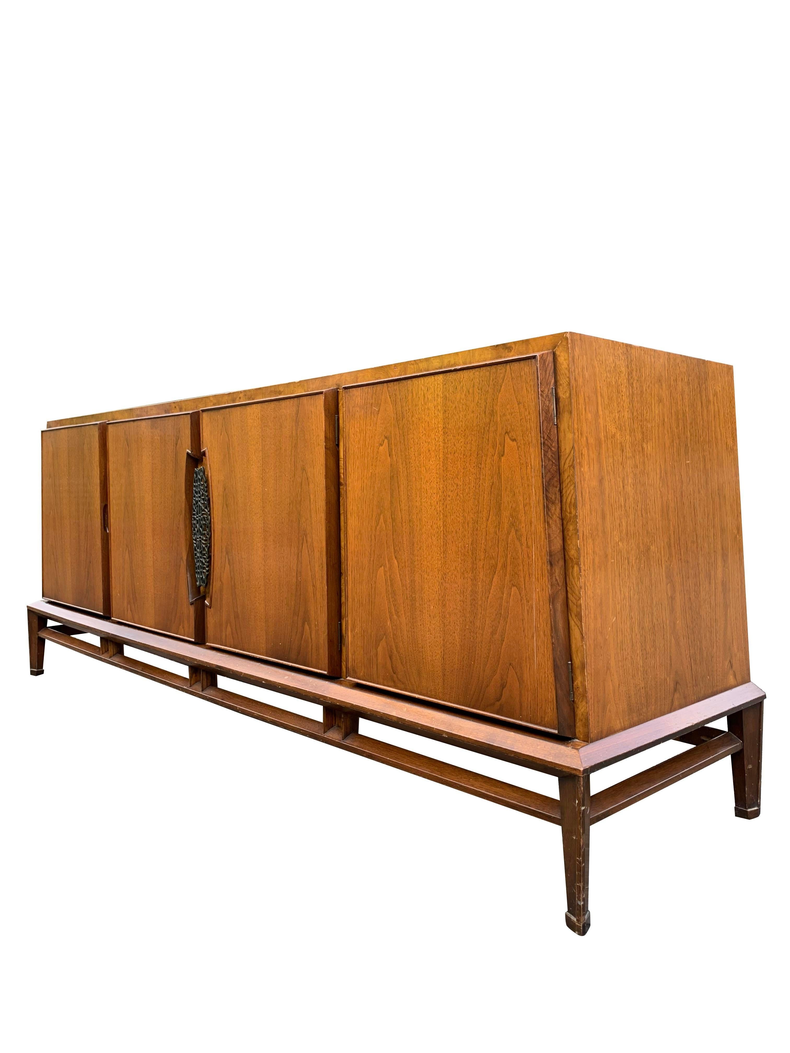 Vintage Helen Hobey Baker Mid-Century Modern Credenza

This vintage credenza is a must-have for any collector of mid-century modern furniture. The iconic design, high-quality materials, and ample storage space make it a valuable and stylish piece