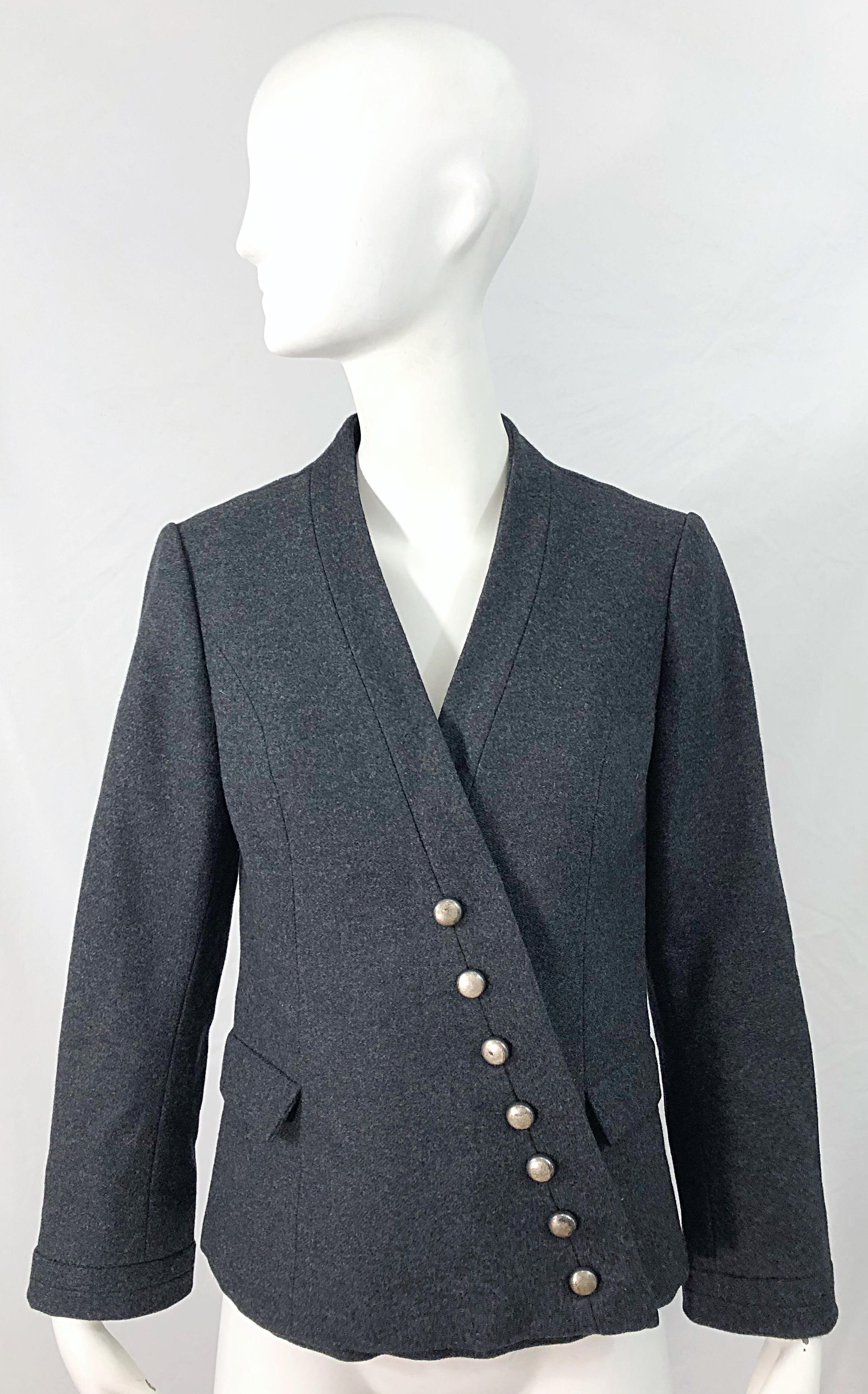 The perfect jacket ! This 1950s mid century HELEN ROSE jacket has it all--style, practicality, warmth, etc. ! Perfect alternative to a black jacket. Soft wool that is great for anytime of year. Silver nickel polished buttons up the front. Fully