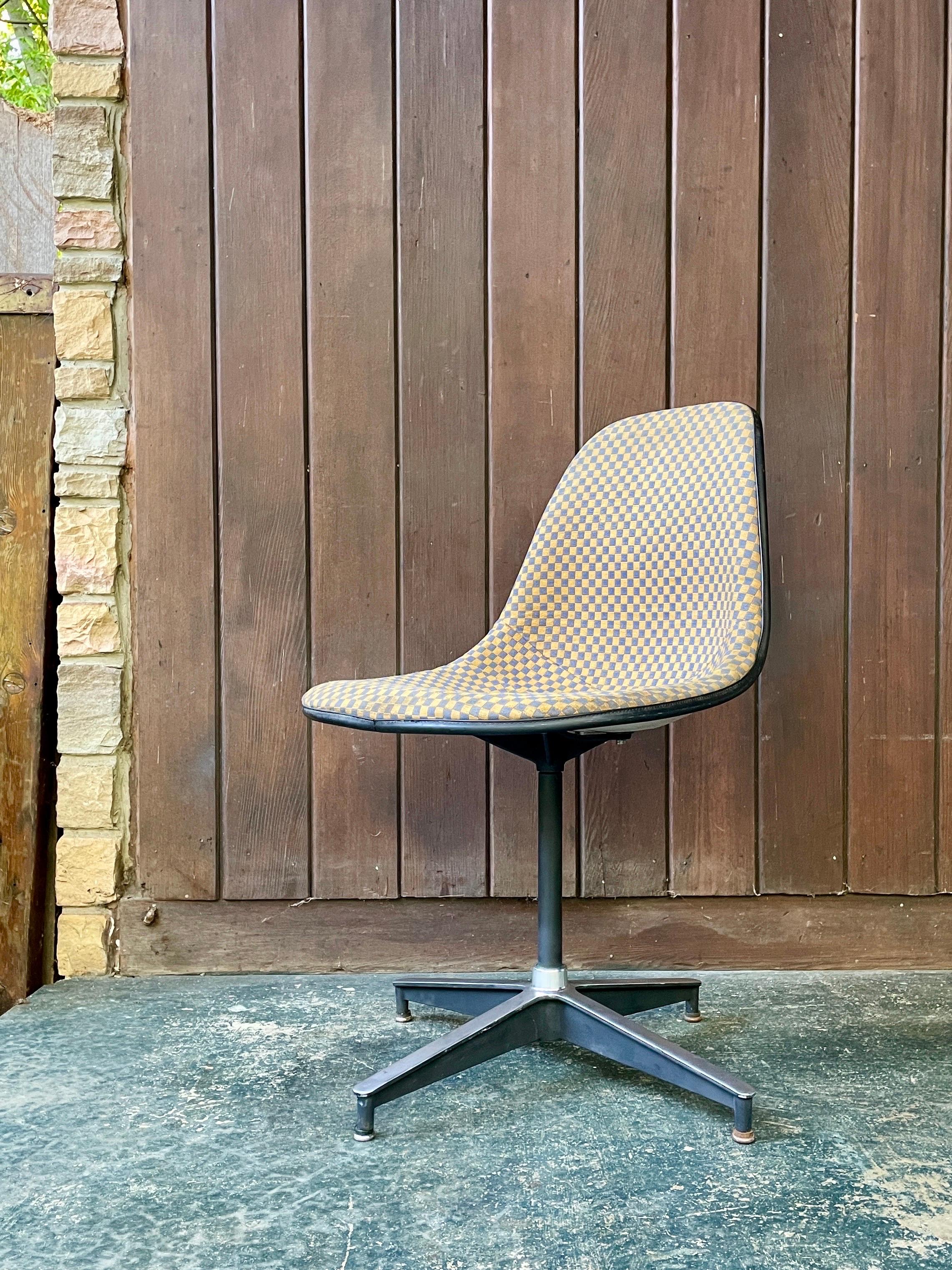 A real Mid-Century Icon that can still hold a place in a collectors home, by the CSS Wall Unit or the ESU Desk. This is a rare 1st generation PSC chair in poor distressed condition. Usable but cosmetically very poor.  The Girard fabric is dingy