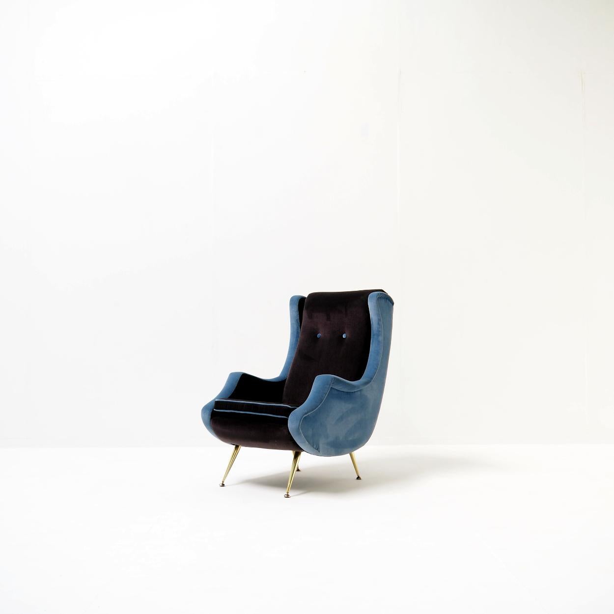 This elegant high-back lounge chair is a striking example of mid-century design, combining iconic style with a fresh, updated touch. Recently reupholstered, it offers reliability in use while preserving its original character. Making it both a